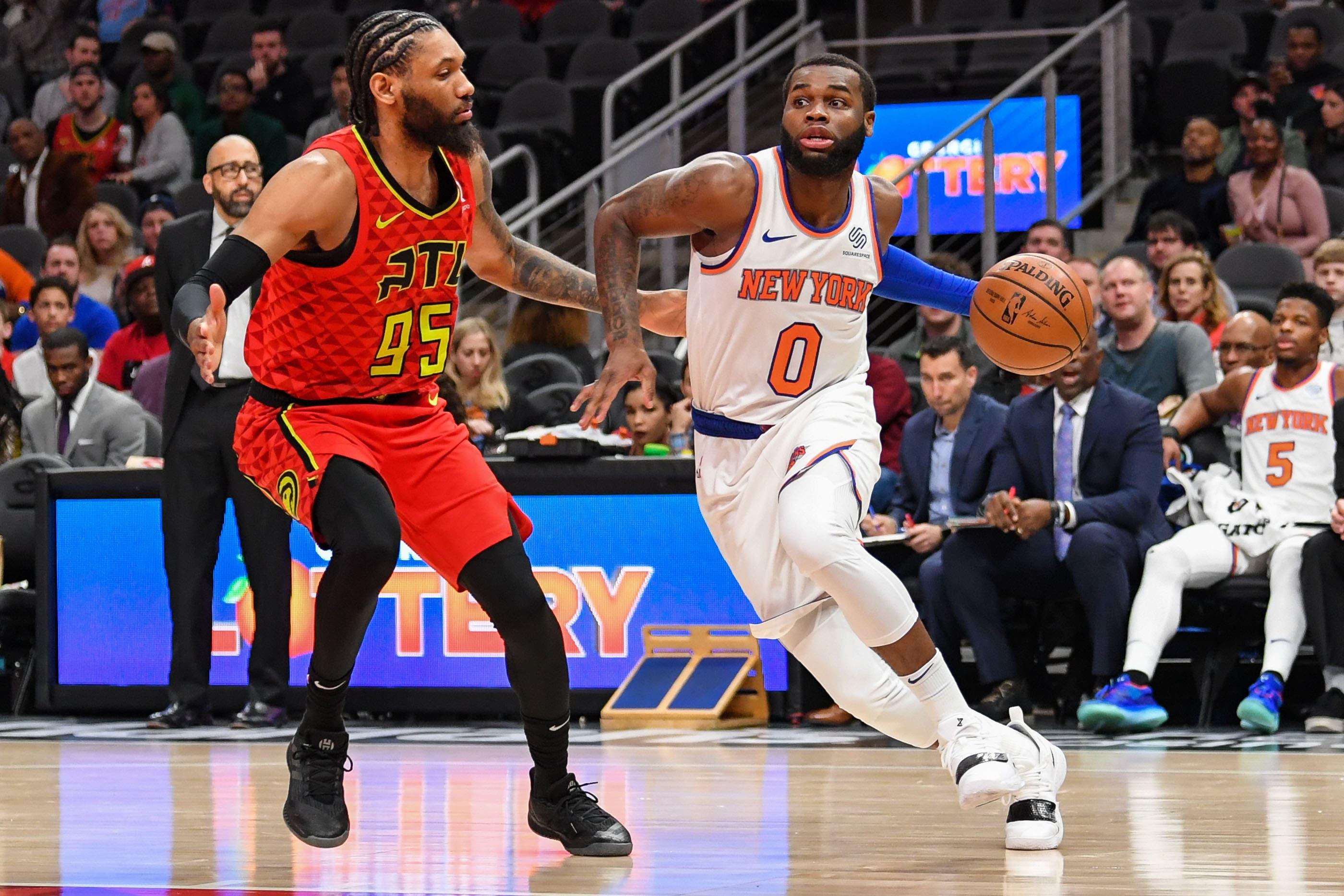 Feb 14, 2019; Atlanta, GA, USA; New York Knicks guard Kadeem Allen (0) dribbles against Atlanta Hawks forward DeAndre' Bembry (95) during the first half at State Farm Arena. Mandatory Credit: Dale Zanine-USA TODAY Sports / Dale Zanine