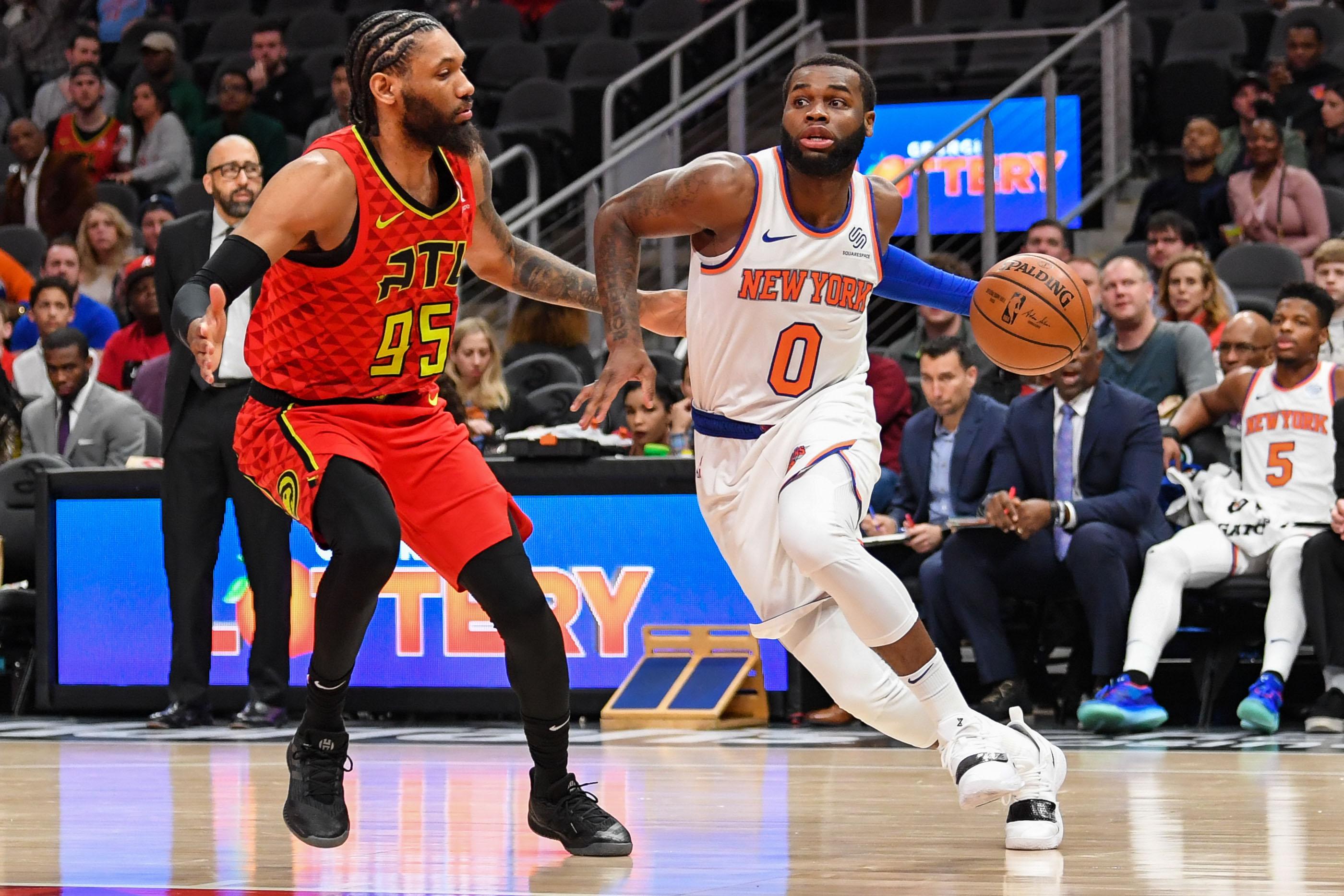 Feb 14, 2019; Atlanta, GA, USA; New York Knicks guard Kadeem Allen (0) dribbles against Atlanta Hawks forward DeAndre' Bembry (95) during the first half at State Farm Arena. Mandatory Credit: Dale Zanine-USA TODAY Sports