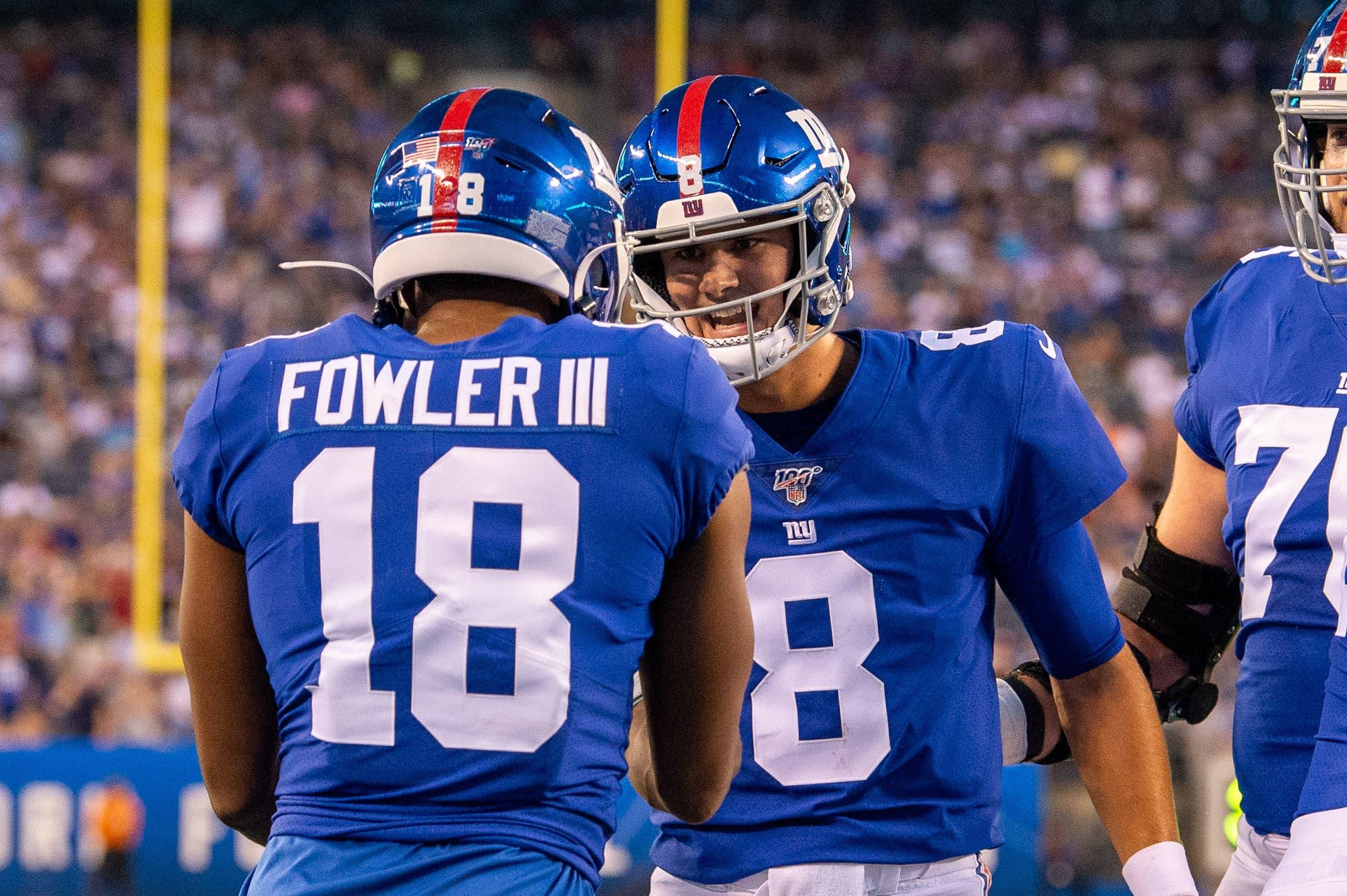 Aug 8, 2019; East Rutherford, NJ, USA; New York Giants wide receiver Bennie Fowler (18) celebrates with quarterback Daniel Jones (8) after catching a touchdown pass against the New York Jets during the first quarter of a preseason game at MetLife Stadium. Mandatory Credit: Dennis Schneidler-USA TODAY Sports / Dennis Schneidler