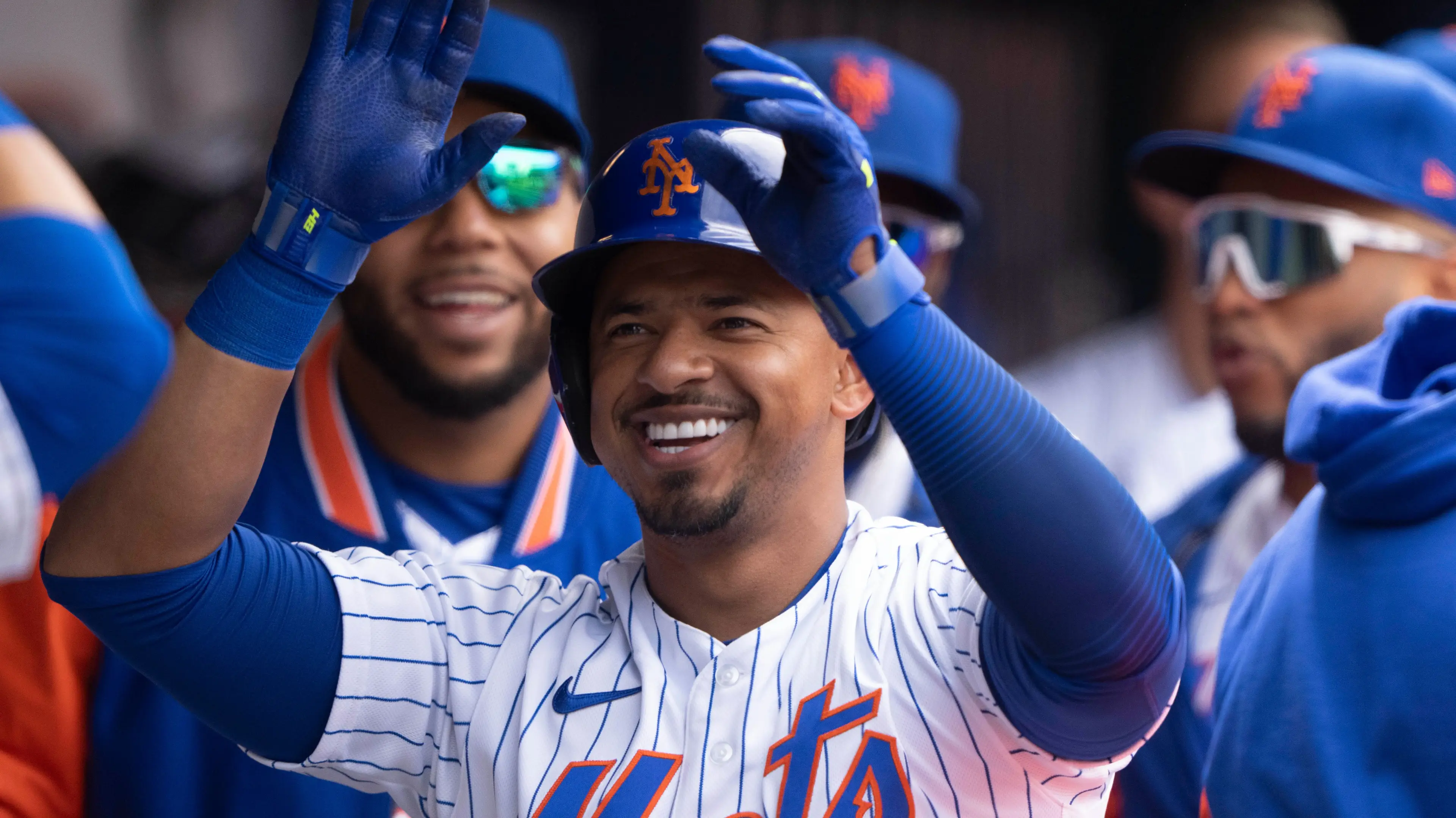 Apr 21, 2022; New York City, New York, USA; Teammates congratulate New York Mets third baseman Eduardo Escobar (10) for hitting a home run against the San Francisco Giants during the second inning at Citi Field / Gregory Fisher-USA TODAY Sports
