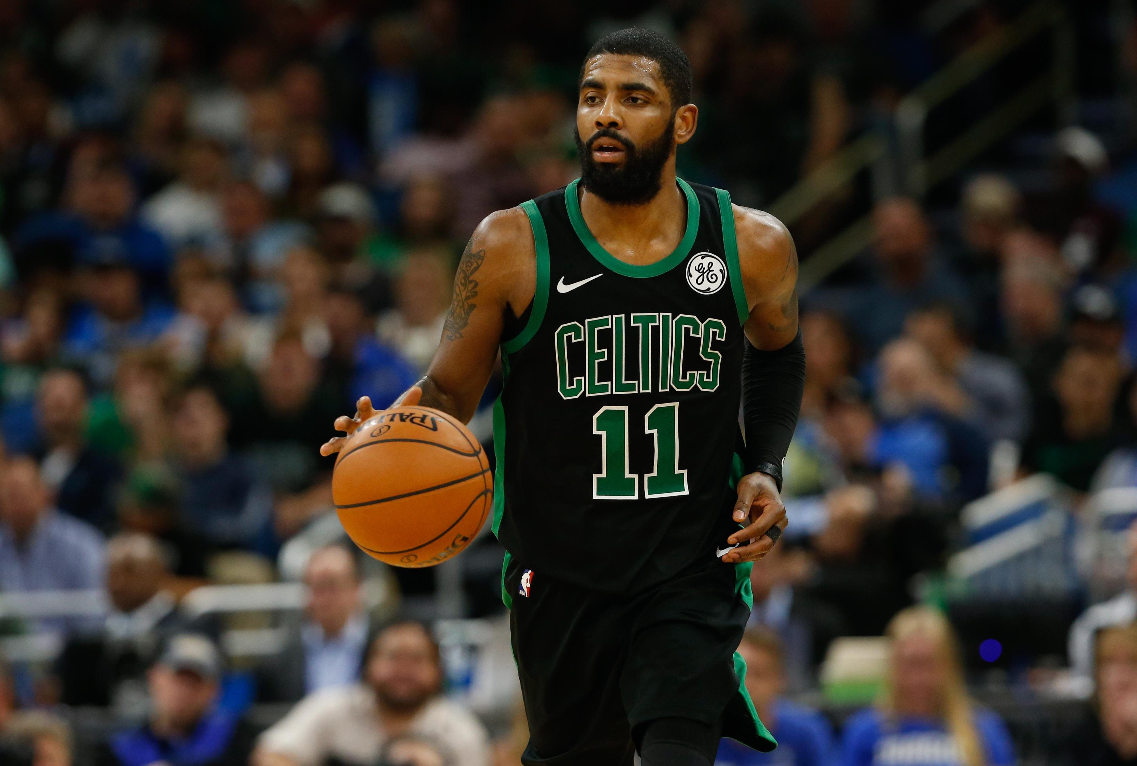 Jan 12, 2019; Orlando, FL, USA; Boston Celtics guard Kyrie Irving (11) dribbles the ball during the second half at Amway Center. Mandatory Credit: Kim Klement-USA TODAY Sports / Kim Klement