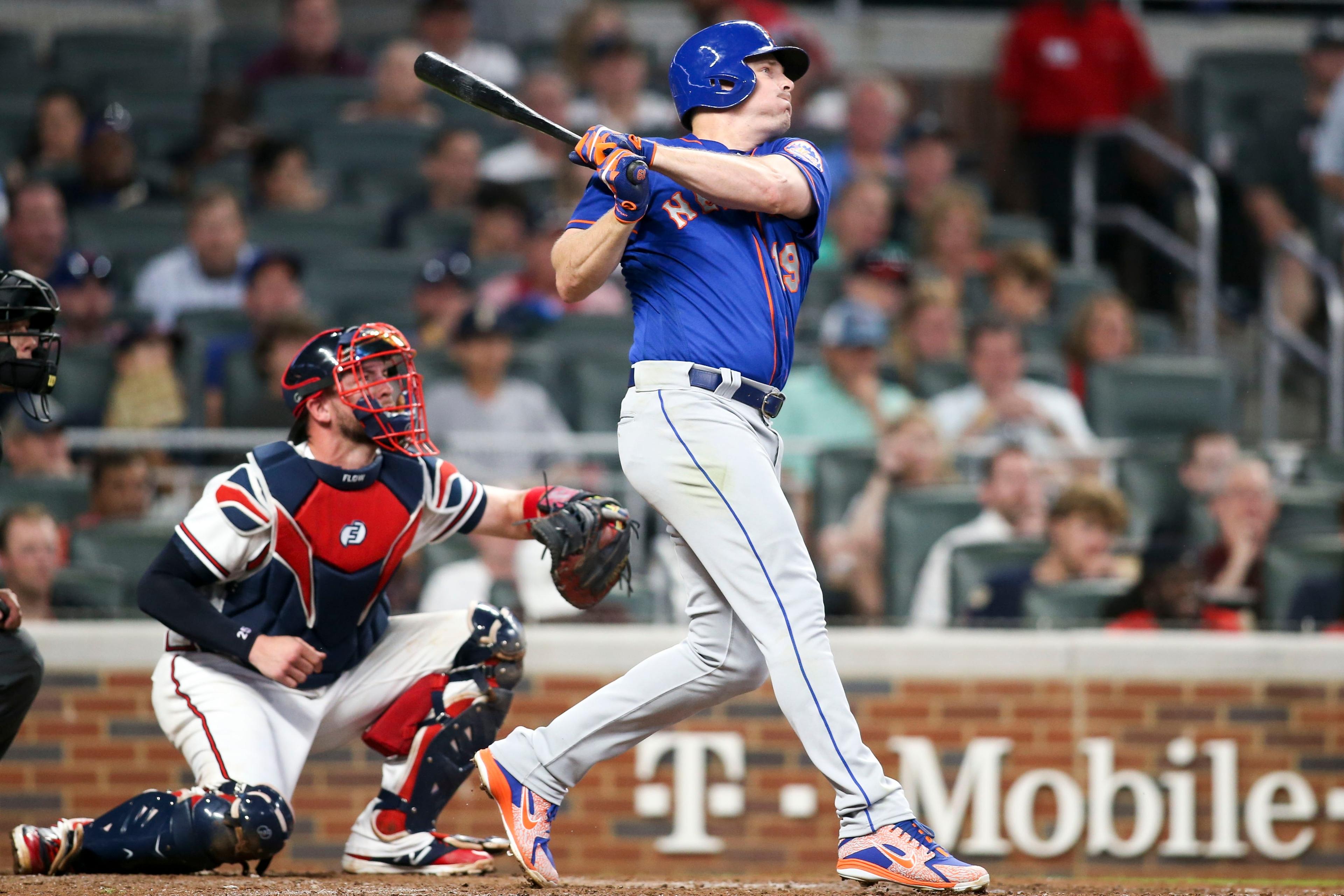 Jun 12, 2018; Atlanta, GA, USA; New York Mets right fielder Jay Bruce (19) hits a two-run double against the Atlanta Braves in the sixth inning at SunTrust Park. Mandatory Credit: Brett Davis-USA TODAY Sports
