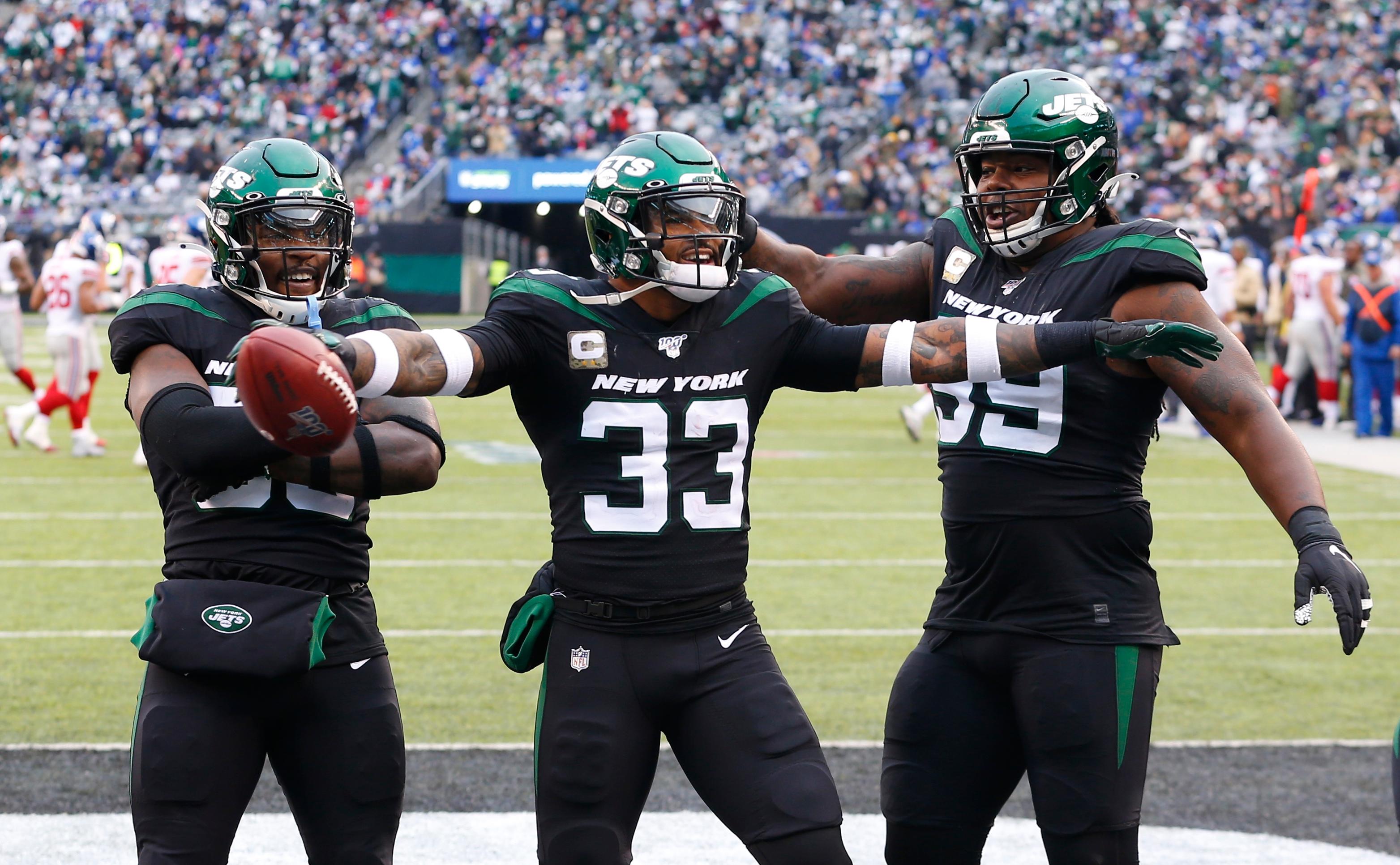 Nov 10, 2019; East Rutherford, NJ, USA; New York Jets strong safety Jamal Adams (33) celebrates after scoring a touchdown against the New York Giants during the second half at MetLife Stadium. Mandatory Credit: Noah K. Murray-USA TODAY Sports