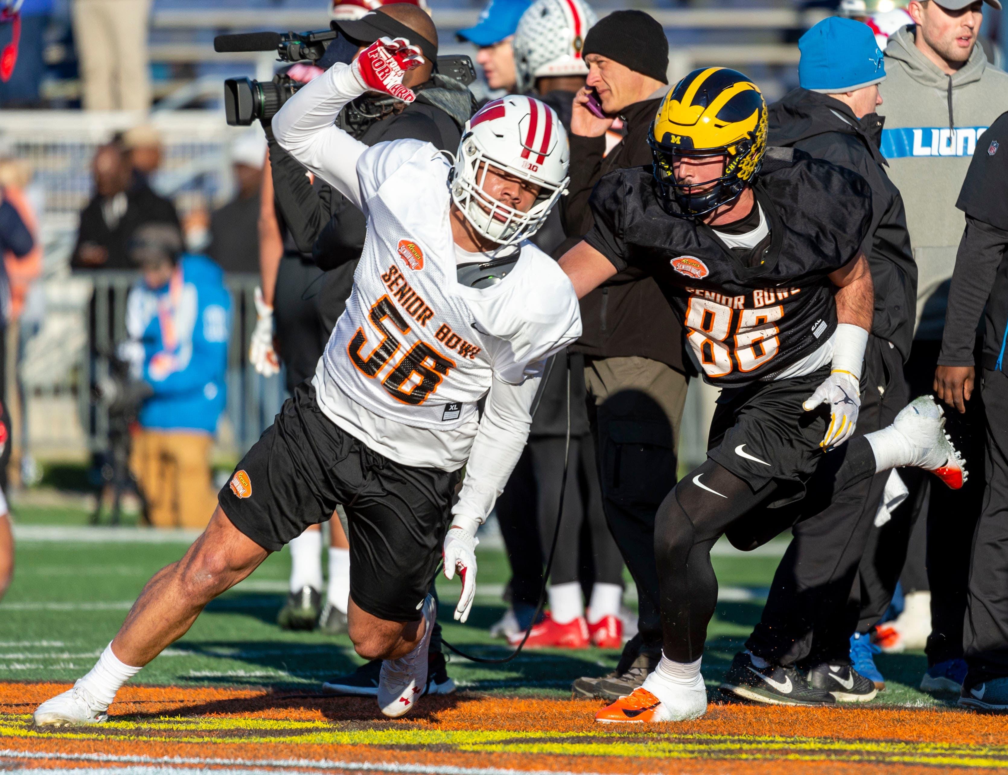 Jan 21, 2020; Mobile, Alabama, USA; North outside linebacker Zack Baun of Wisconsin (56) works around North tight end Sean McKeon of Michigan (86) during Senior Bowl practice at Ladd-Peebles Stadium. Mandatory Credit: Vasha Hunt-USA TODAY Sports / Vasha Hunt