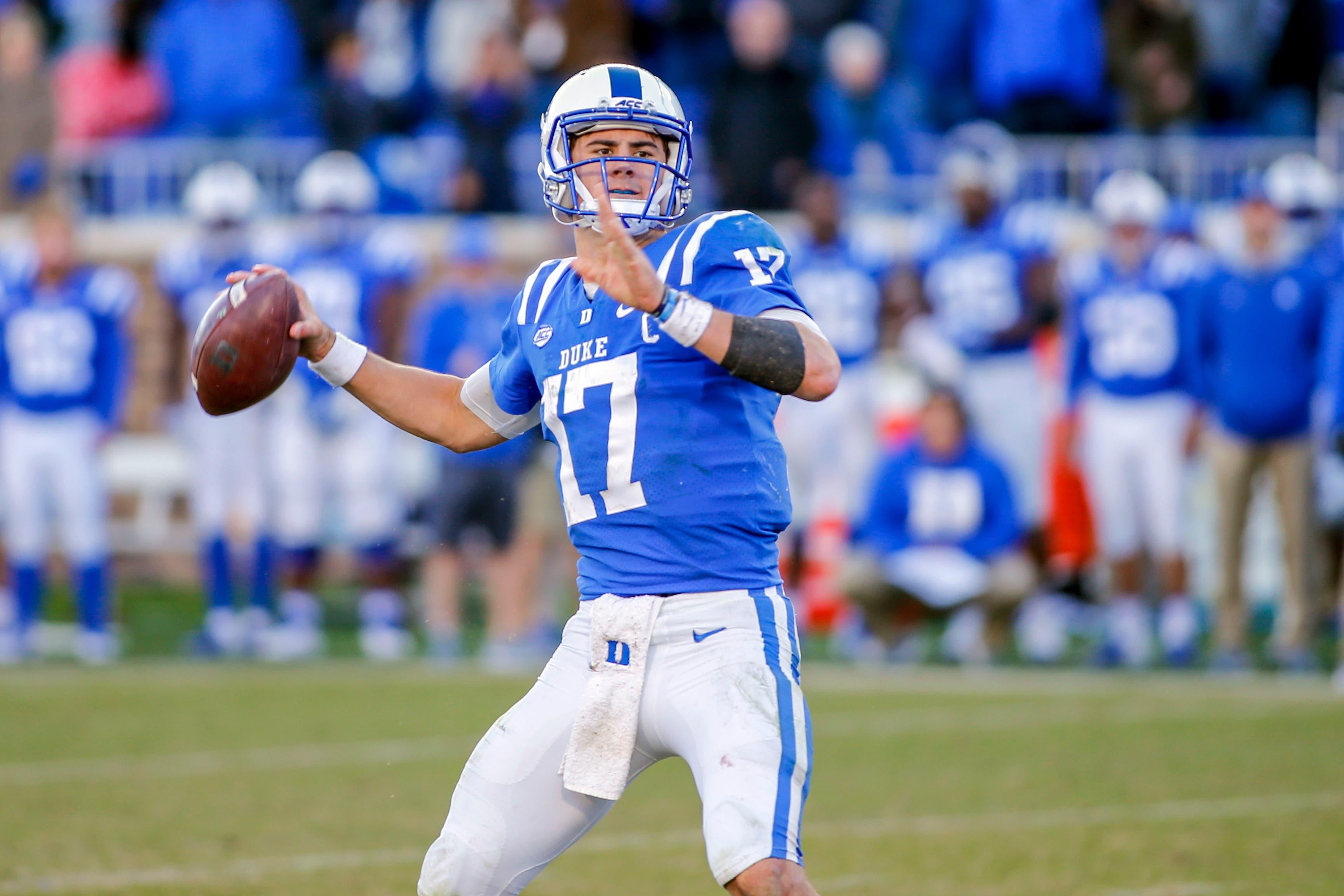 Nov 10, 2018; Durham, NC, USA; Duke Blue Devils quarterback Daniel Jones passes the football in the second half against the North Carolina Tar Heels at Wallace Wade Stadium. The Duke Blue Devils won 42-35. Mandatory Credit: Nell Redmond-USA TODAY Sports / Nell Redmond