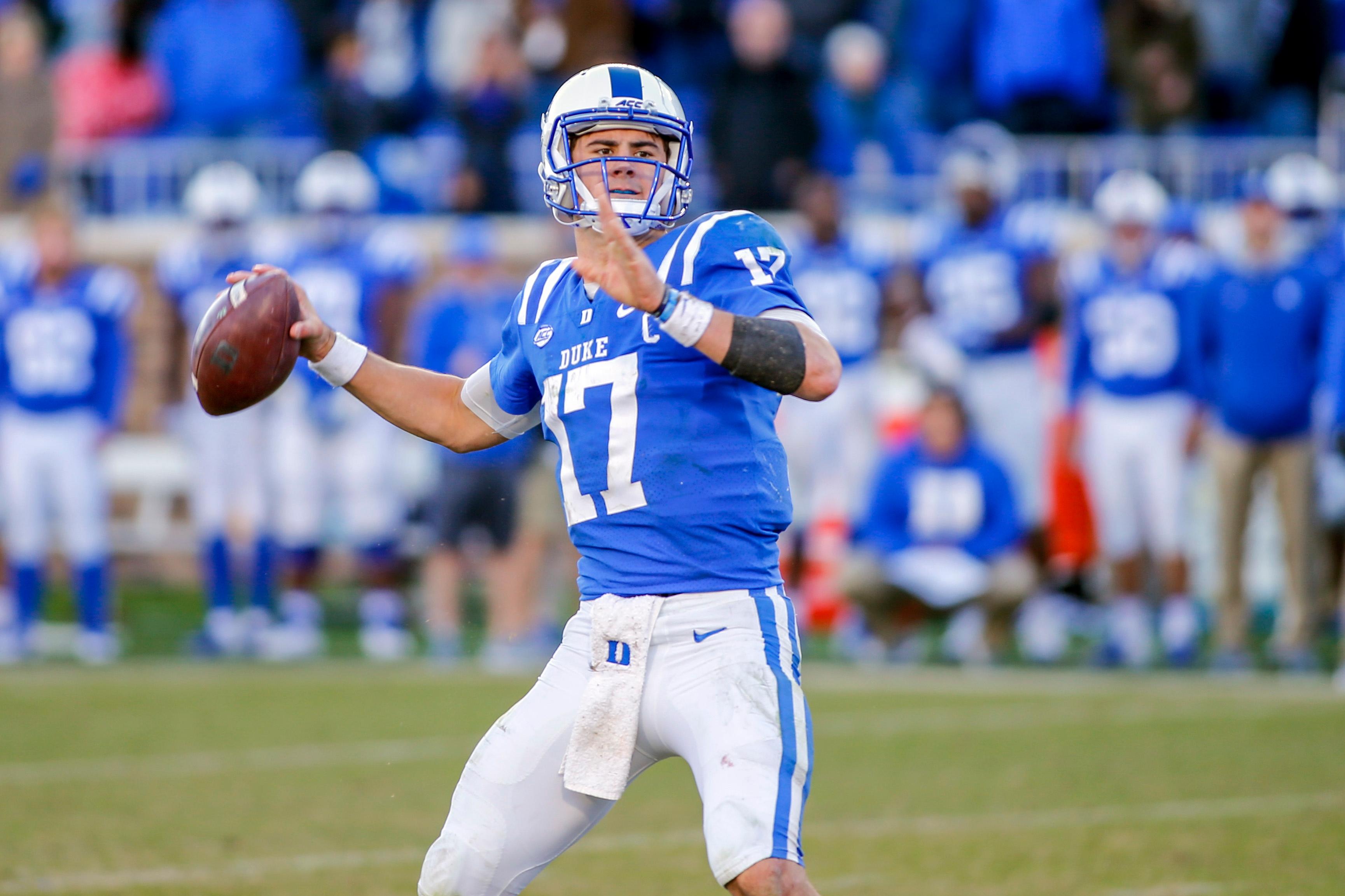 Nov 10, 2018; Durham, NC, USA; Duke Blue Devils quarterback Daniel Jones passes the football in the second half against the North Carolina Tar Heels at Wallace Wade Stadium. The Duke Blue Devils won 42-35. Mandatory Credit: Nell Redmond-USA TODAY Sports