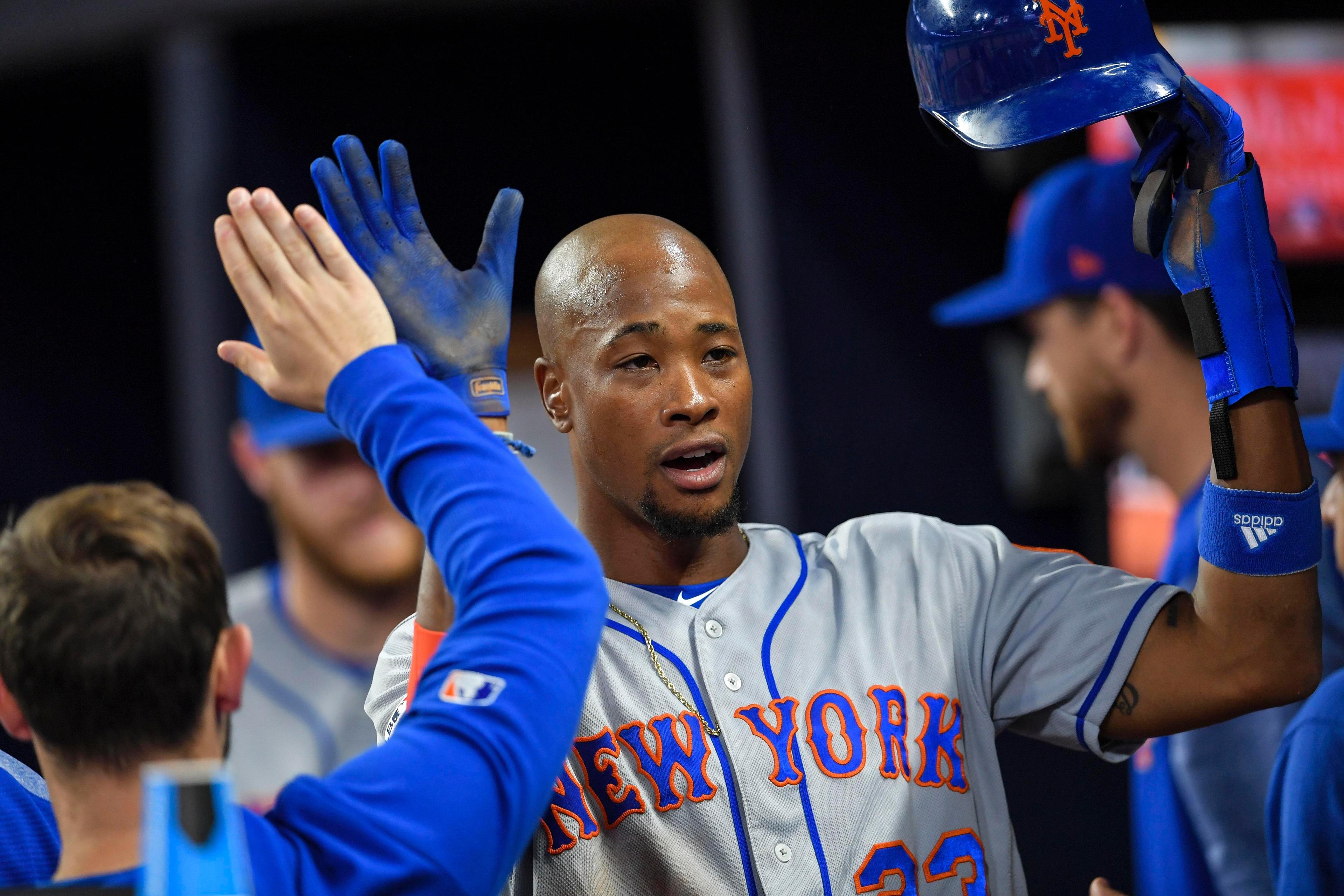 Apr 12, 2019; Atlanta, GA, USA; New York Mets Keon Broxton (23) gets high fives after scoring against the Atlanta Braves during the fourth inning at SunTrust Park. Mandatory Credit: Dale Zanine-USA TODAY Sports / Dale Zanine