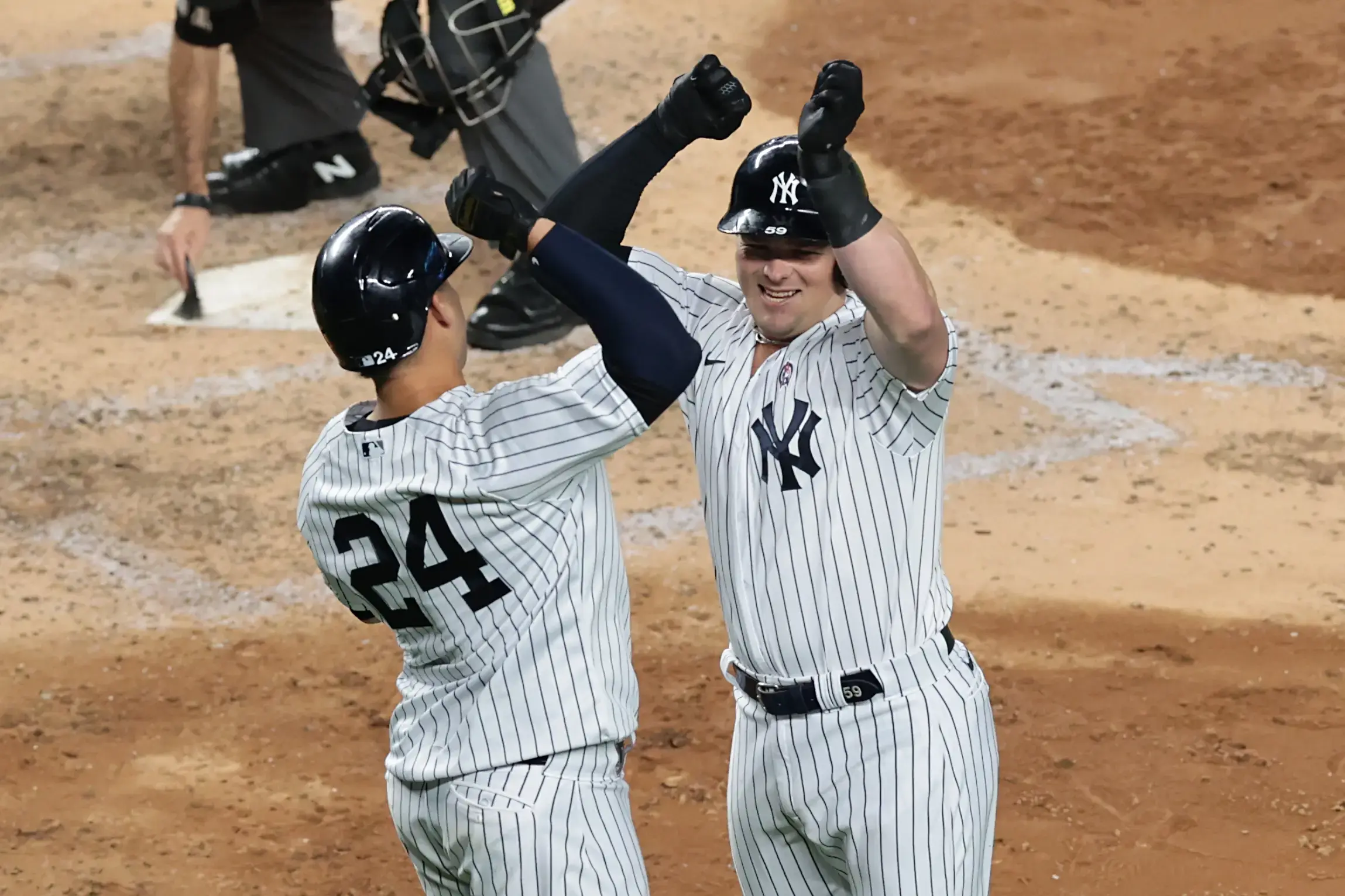 Sep 11, 2020; Bronx, New York, USA; New York Yankees first baseman Luke Voit (59) celebrates his second three run home run pf the game with catcher Gary Sanchez (24) during the fifth inning against the Baltimore Orioles at Yankee Stadium. Mandatory Credit: Vincent Carchietta-USA TODAY Sports / © Vincent Carchietta-USA TODAY Sports