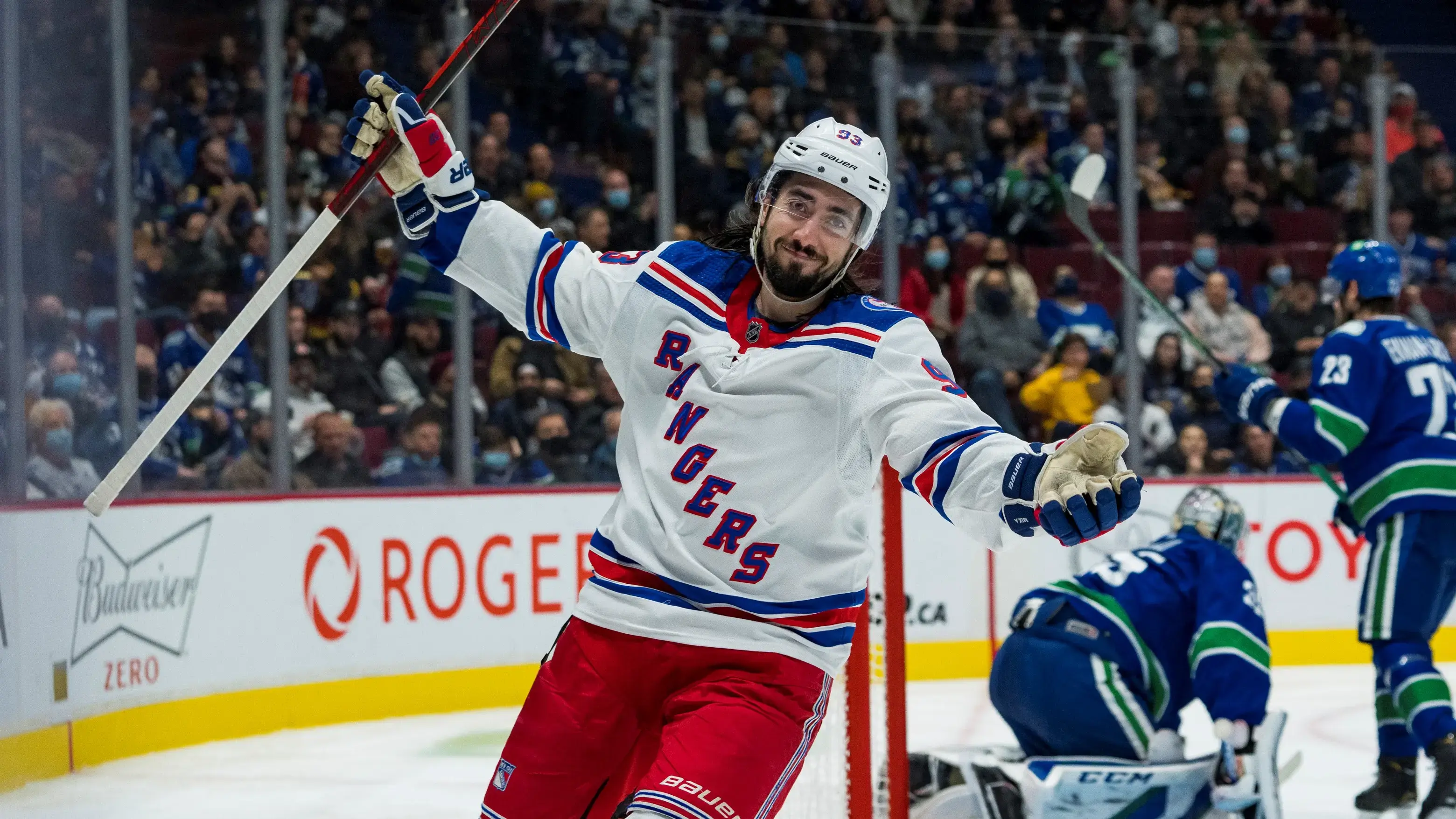 Nov 2, 2021; Vancouver, British Columbia, CAN; New York Rangers forward Mika Zibanejad (93) celebrates his goal scored on Vancouver Canucks goalie Thatcher Demko (35) in the second period at Rogers Arena. Mandatory Credit: Bob Frid-USA TODAY Sports / Bob Frid-USA TODAY Sports