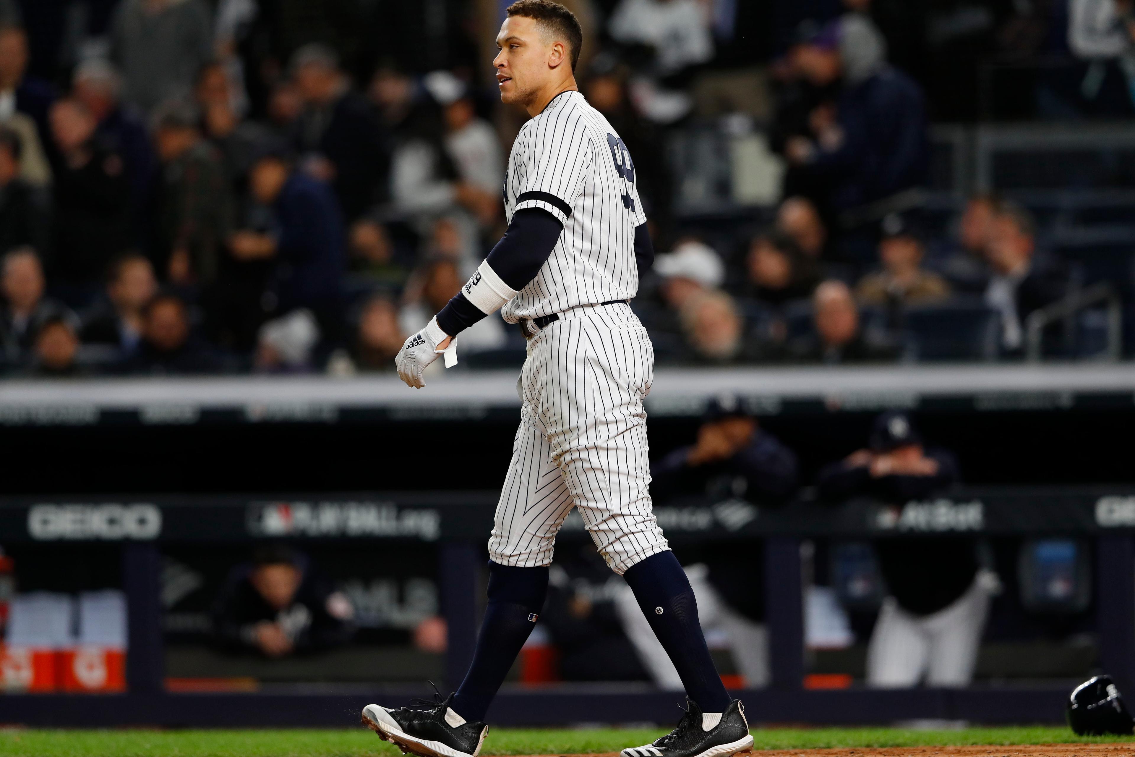 Oct 17, 2019; Bronx, NY, USA; New York Yankees right fielder Aaron Judge (99) reacts after striking out in the sixth inning against the Houston Astros in game four of the 2019 ALCS playoff baseball series at Yankee Stadium. Mandatory Credit: Noah K. Murray-USA TODAY Sports