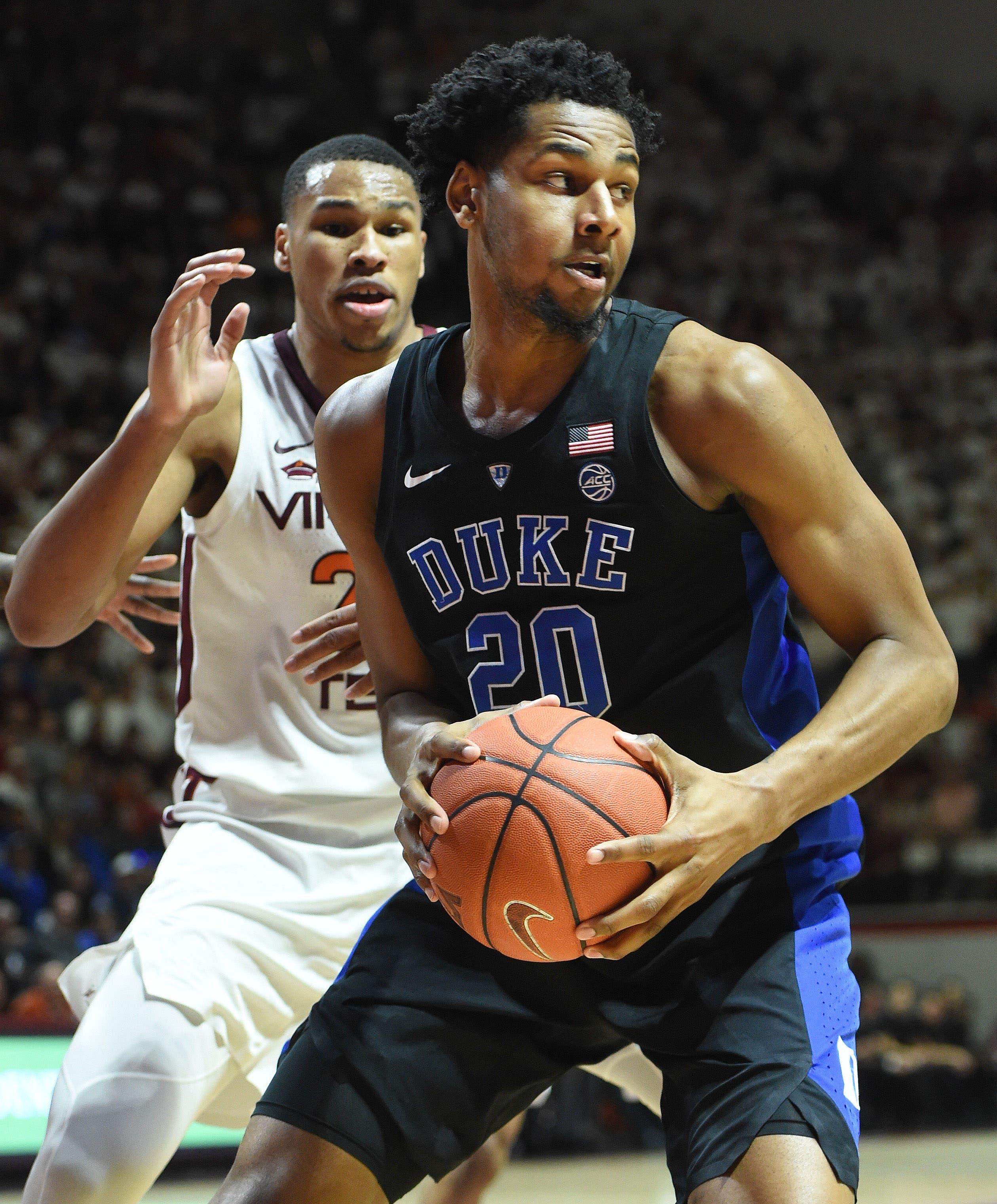 Feb 26, 2019; Blacksburg, VA, USA; Duke Blue Devils center Marques Bolden (20) looks to pass while being defended by Virginia Tech Hokies forward Kerry Blackshear Jr. (24) in the first half at Cassell Coliseum. Mandatory Credit: Michael Shroyer-USA TODAY Sports / Michael Thomas Shroyer