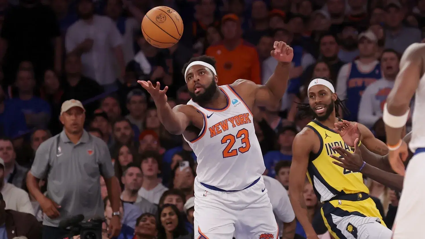 New York Knicks center Mitchell Robinson (23) grabs a rebound against Indiana Pacers forward Isaiah Jackson (22) during the fourth quarter of game one of the second round of the 2024 NBA playoffs at Madison Square Garden. / Brad Penner-USA TODAY Sports