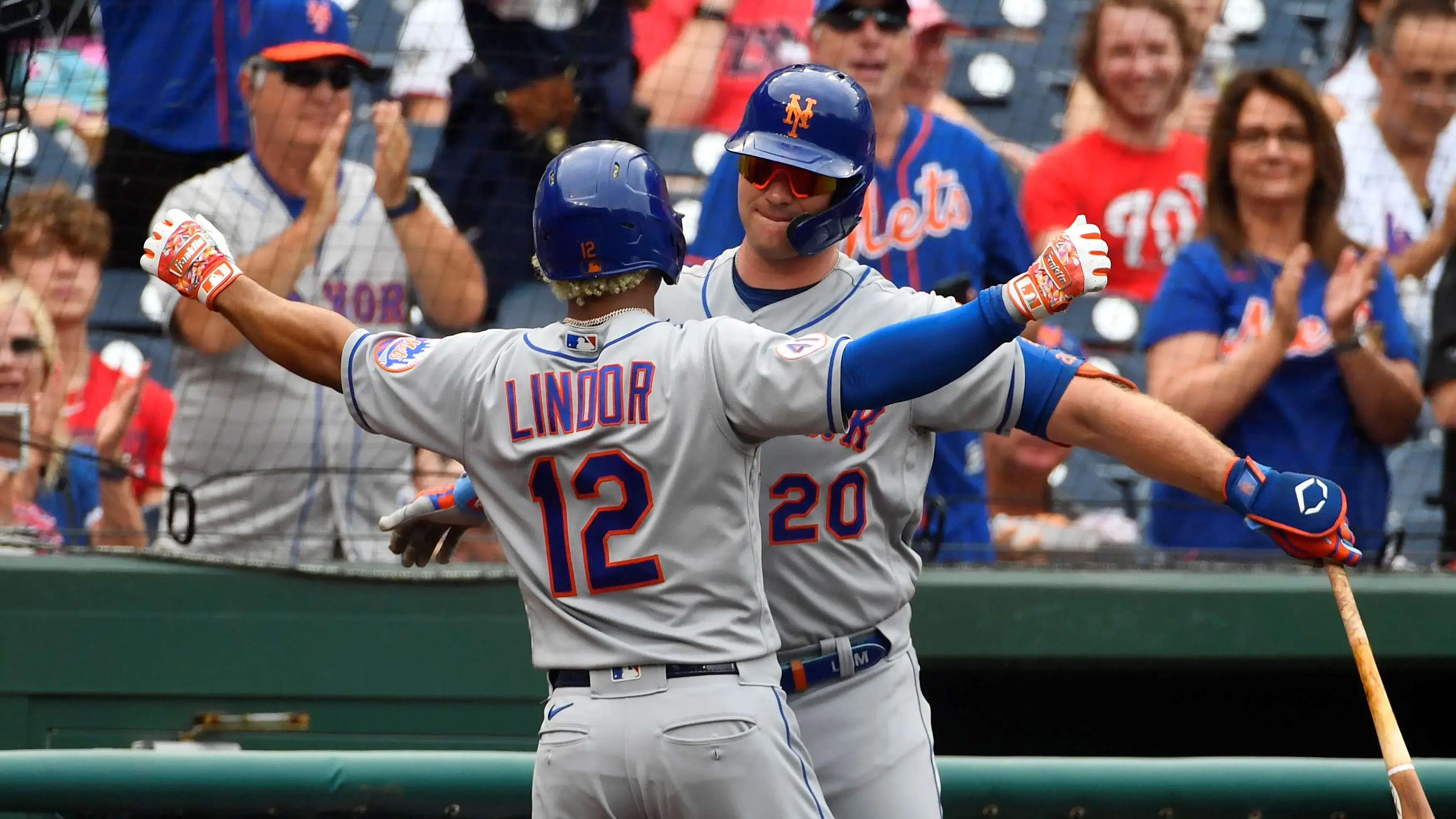 Jun 19, 2021; Washington, District of Columbia, USA; New York Mets shortstop Francisco Lindor (12) is congratulated by first baseman Pete Alonso (20) after hitting a two run home run against the Washington Nationals during the first inning at Nationals Park. Mandatory Credit: Brad Mills-USA TODAY Sports / Brad Mills-USA TODAY Sports