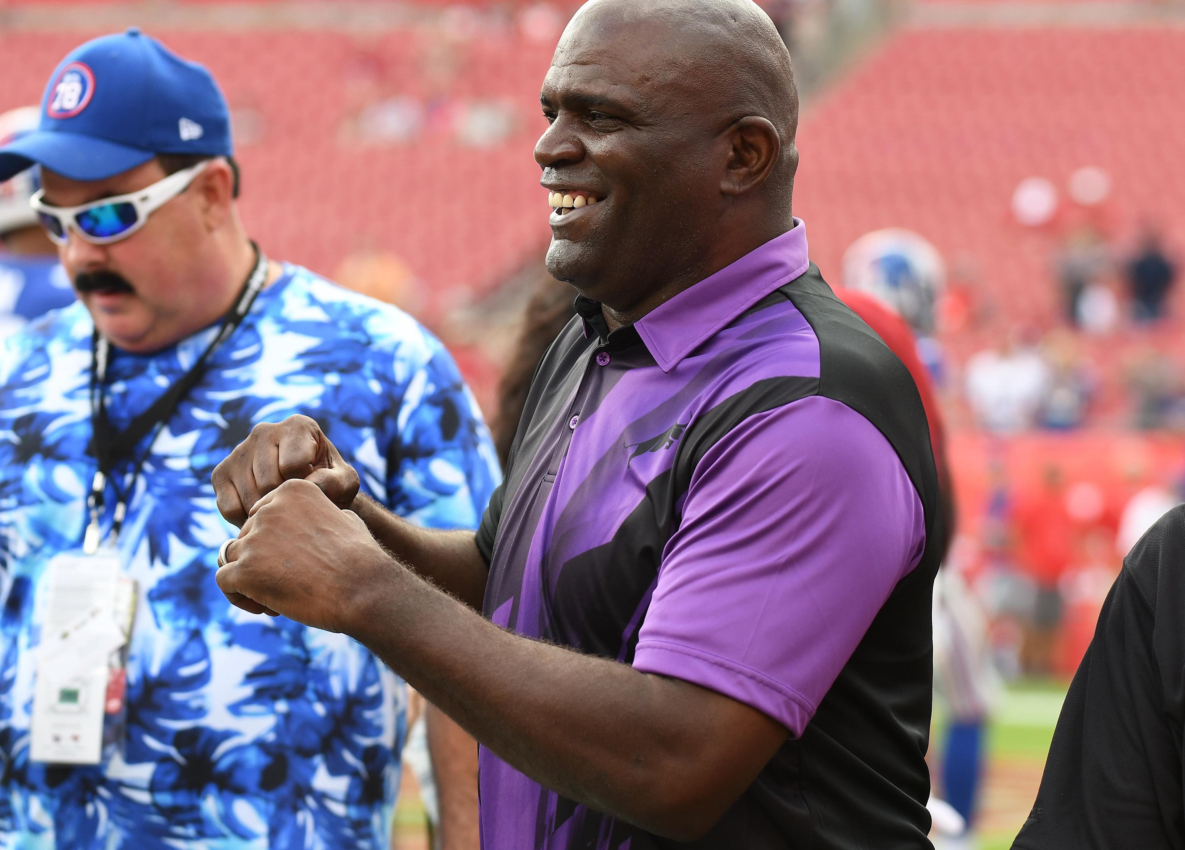 Oct 1, 2017; Tampa, FL, USA; National Football League Hall of Fame player Lawrence Taylor talks with fans on the field before the game between his former team the New York Giants and the Tampa Bay Buccaneers at Raymond James Stadium. Mandatory Credit: Jonathan Dyer-USA TODAY Sports / Jonathan Dyer