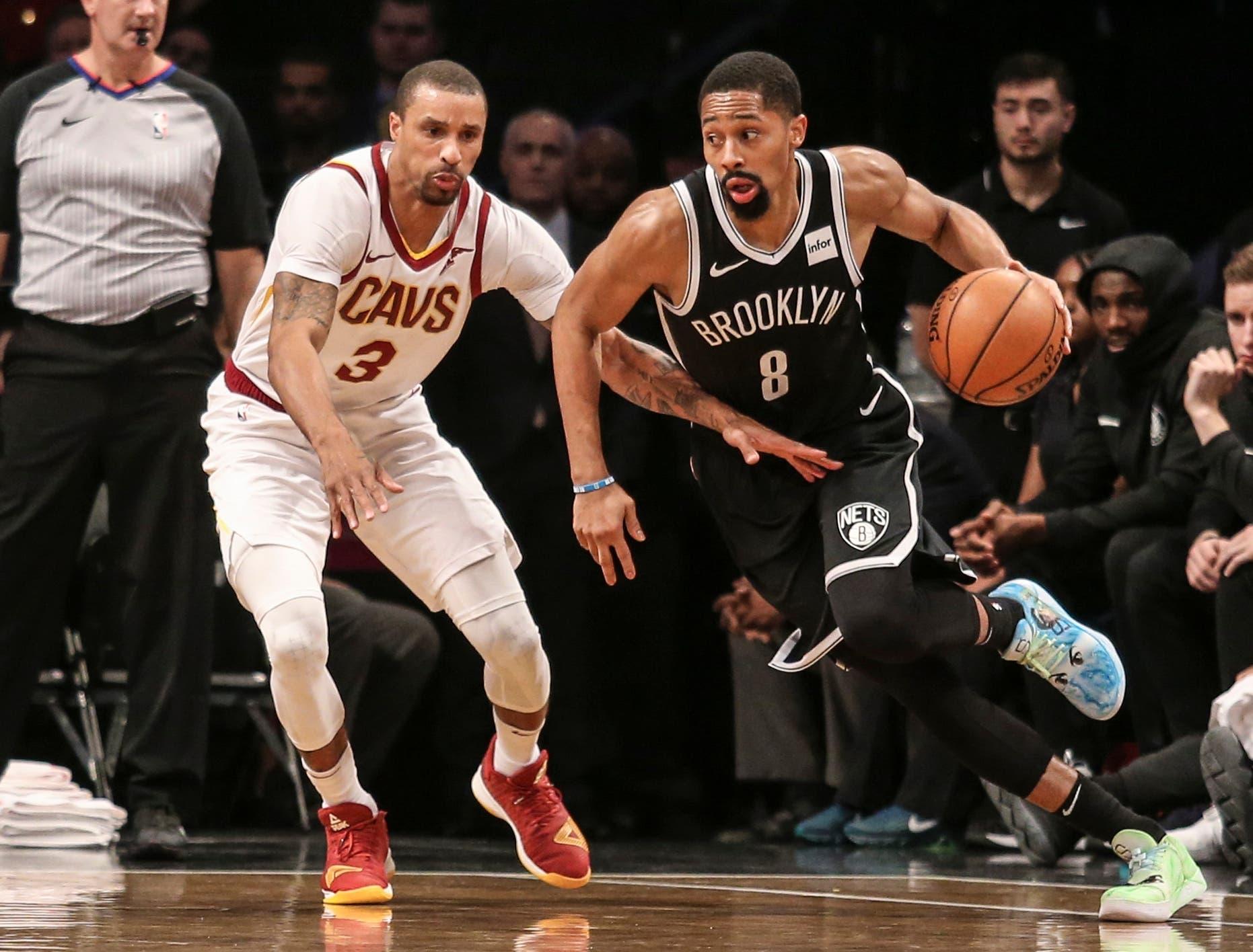 Brooklyn Nets guard Spencer Dinwiddie drives past Cleveland Cavaliers guard George Hill in the first quarter at Barclays Center. / Wendell Cruz/USA TODAY Sports