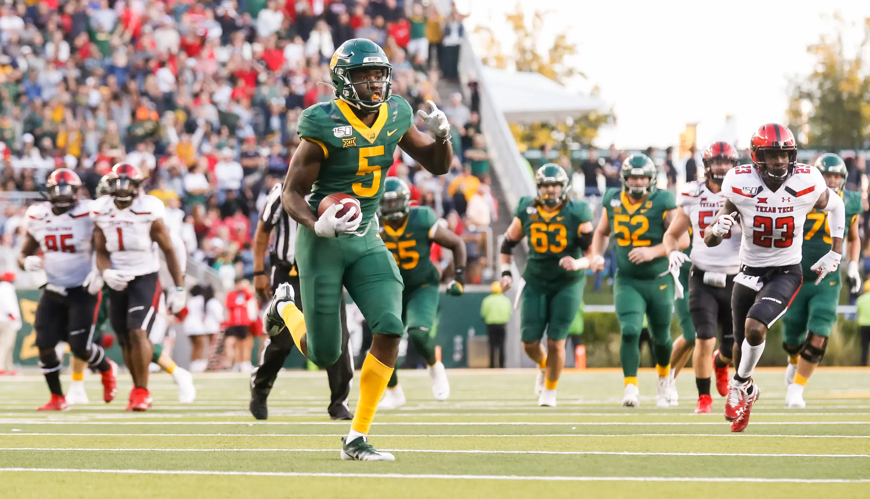 Oct 12, 2019; Waco, TX, USA; Baylor Bears wide receiver Denzel Mims (5) runs after the catch against the Texas Tech Red Raiders during the second half at McLane Stadium. Mandatory Credit: Ray Carlin-USA TODAY Sports / © Ray Carlin-USA TODAY Sports
