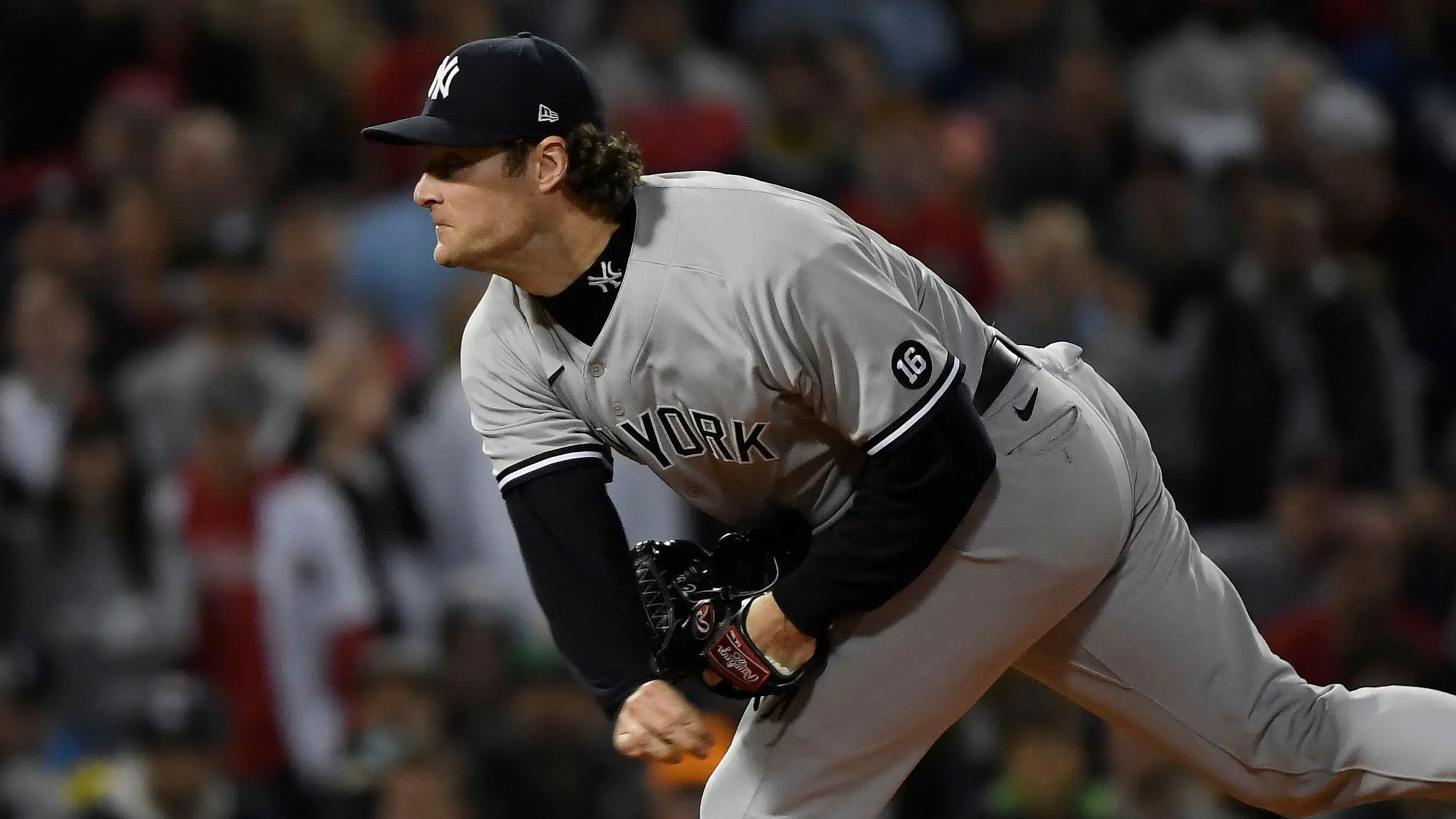 Oct 5, 2021; Boston, Massachusetts, USA; New York Yankees starting pitcher Gerrit Cole (45) throws against the Boston Red Sox during the first inning of the American League Wildcard game at Fenway Park. / Bob DeChiara-USA TODAY Sports