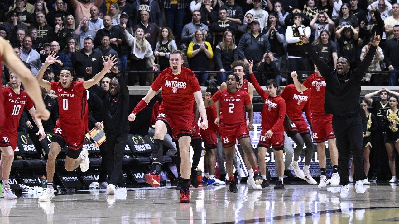 The Rutgers Scarlet Knights celebrate defeating the Purdue Boilermakers at Mackey Arena / Marc Lebryk-USA TODAY Sports