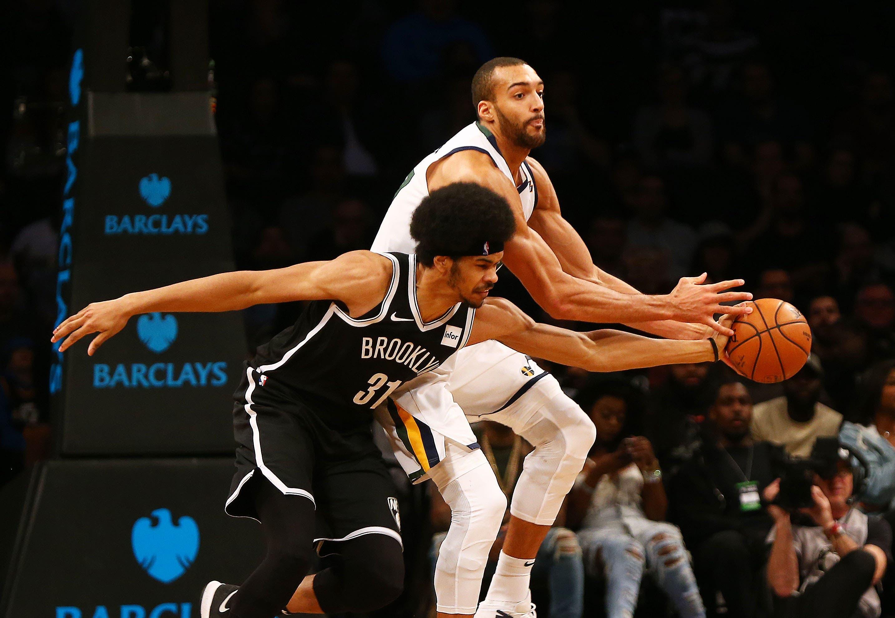 Nov 28, 2018; Brooklyn, NY, USA; Utah Jazz center Rudy Gobert (27) and Brooklyn Nets center Jarrett Allen (31) battle for a loose ball during the second half at Barclays Center. Mandatory Credit: Andy Marlin-USA TODAY Sports / Andy Marlin