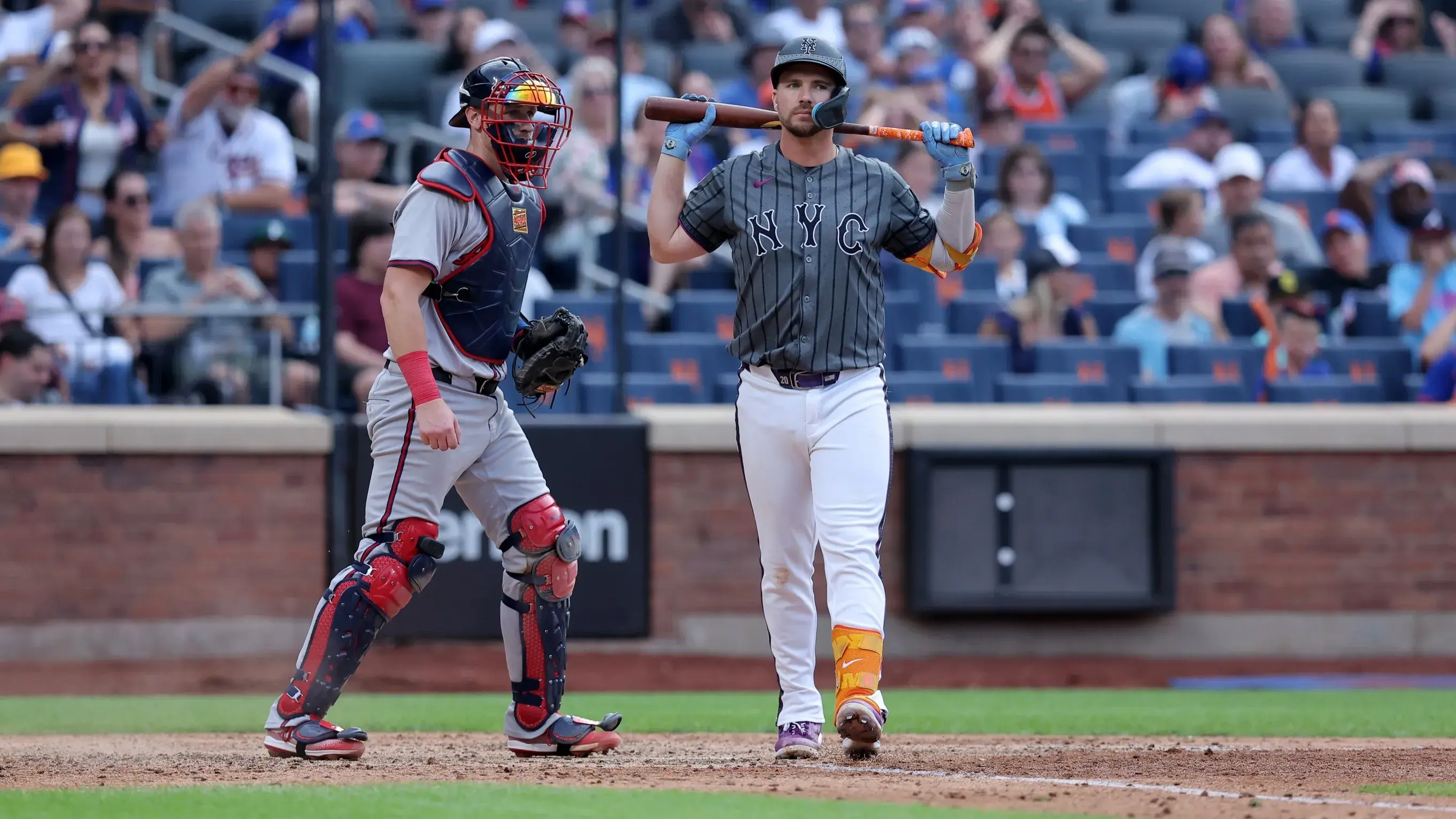 Jul 27, 2024; New York City, New York, USA; New York Mets first baseman Pete Alonso (20) reacts after striking out to end the game against the Atlanta Braves during the ninth inning at Citi Field. / Brad Penner-USA TODAY Sports