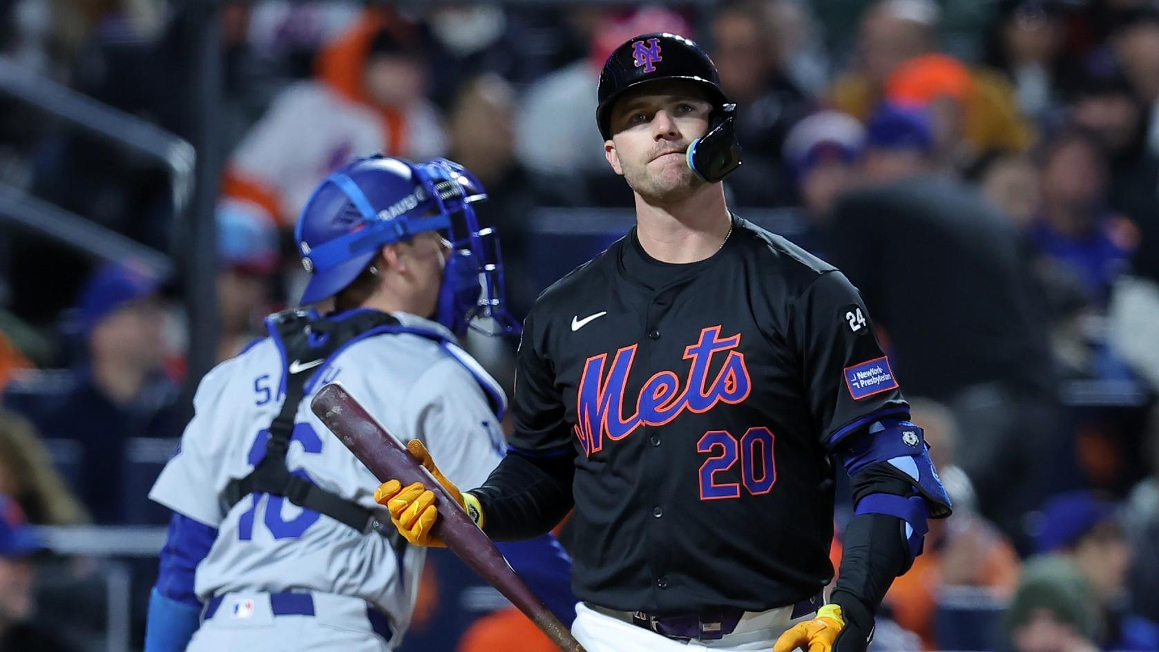 New York Mets first base Pete Alonso (20) reacts after striking out against the Los Angeles Dodgers in the first inning during game three of the NLCS for the 2024 MLB playoffs at Citi Field.