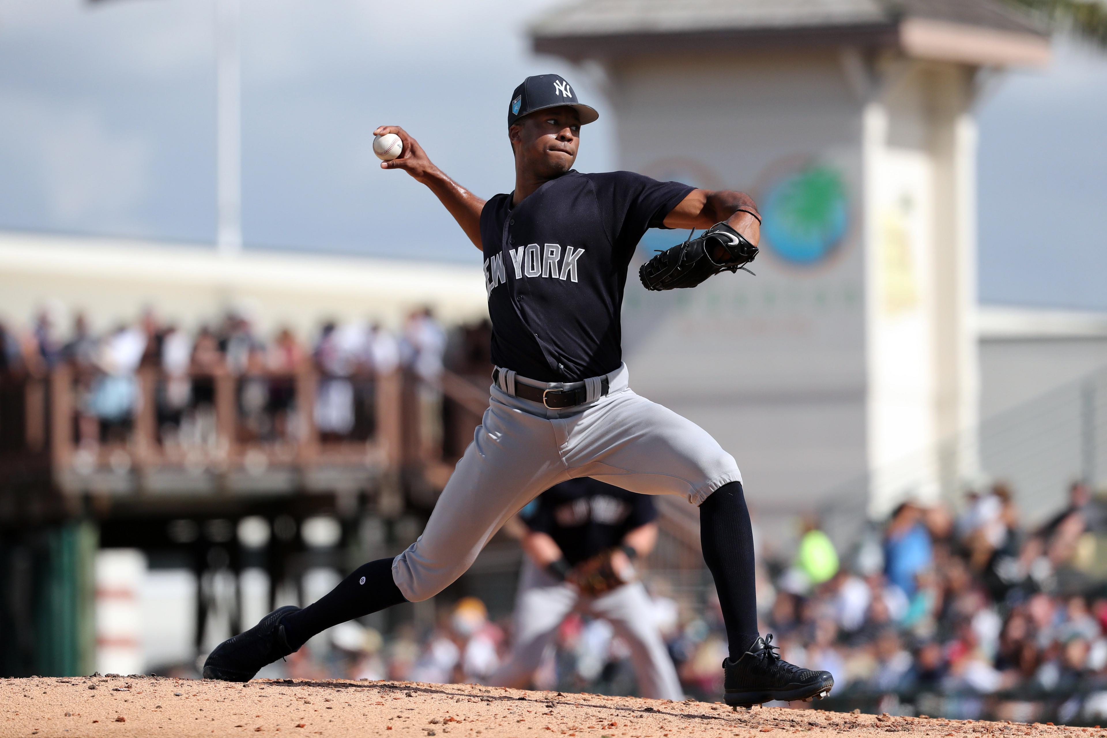 New York Yankees pitcher Dillon Tate throws a pitch during the fifth inning against the Pittsburgh Pirates at LECOM Park.