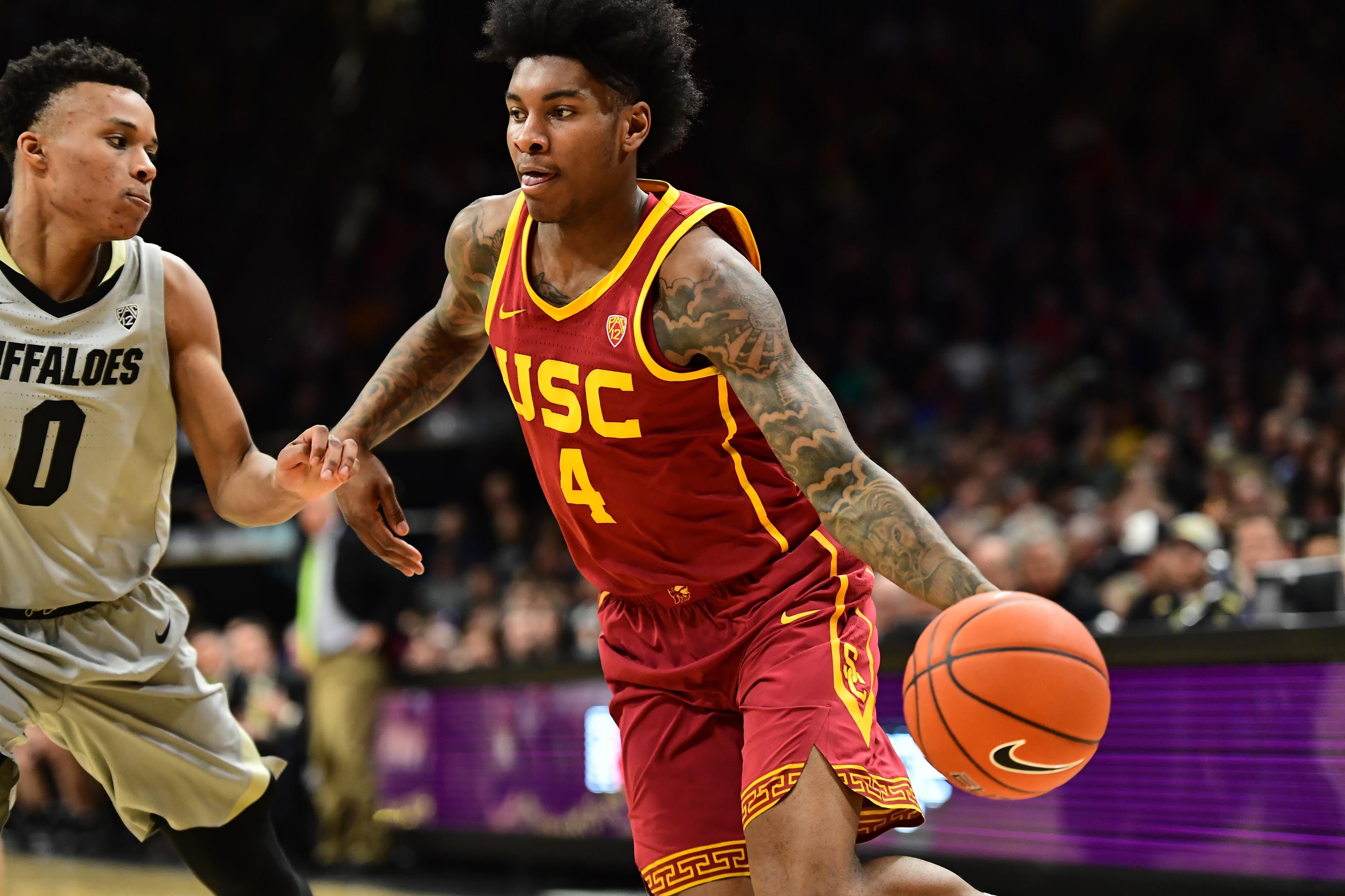 Trojans guard Kevin Porter Jr. drives on Colorado Buffaloes guard Shane Gatling in the second half at the CU Events Center. / Ron Chenoy/USA TODAY Sports