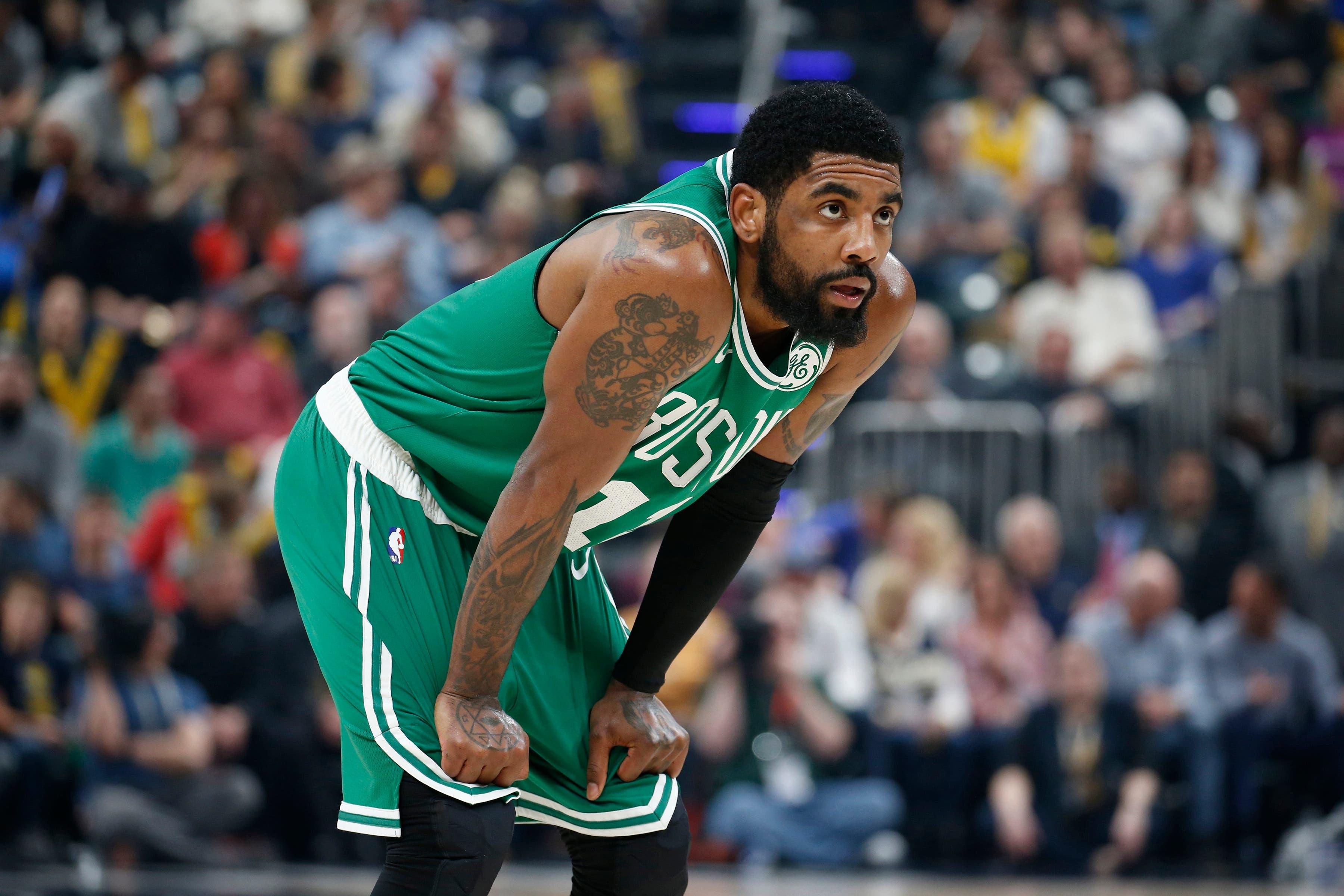 Apr 5, 2019; Indianapolis, IN, USA; Boston Celtics guard Kyrie Irving (11) watches the Indiana Pacers shoot a free throw during the first quarter at Bankers Life Fieldhouse. Mandatory Credit: Brian Spurlock-USA TODAY Sports / Brian Spurlock