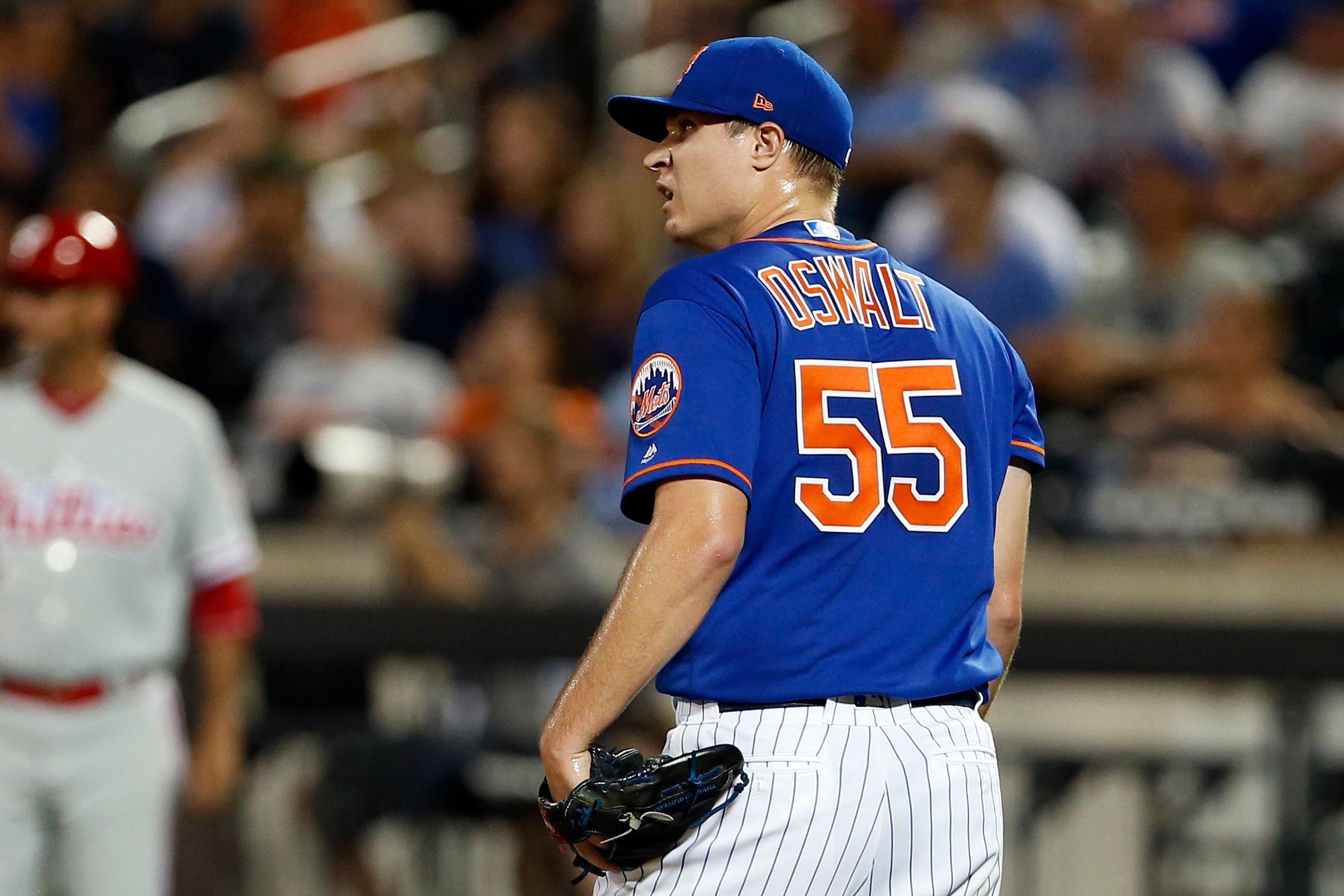 Jul 15, 2018; New York City, NY, USA; New York Mets pitcher Corey Oswalt (55) delivers a pitch during the first inning of the game against the Washington Nationalsat Citi Field. Mandatory Credit: Gregory J. Fisher-USA TODAY Sports