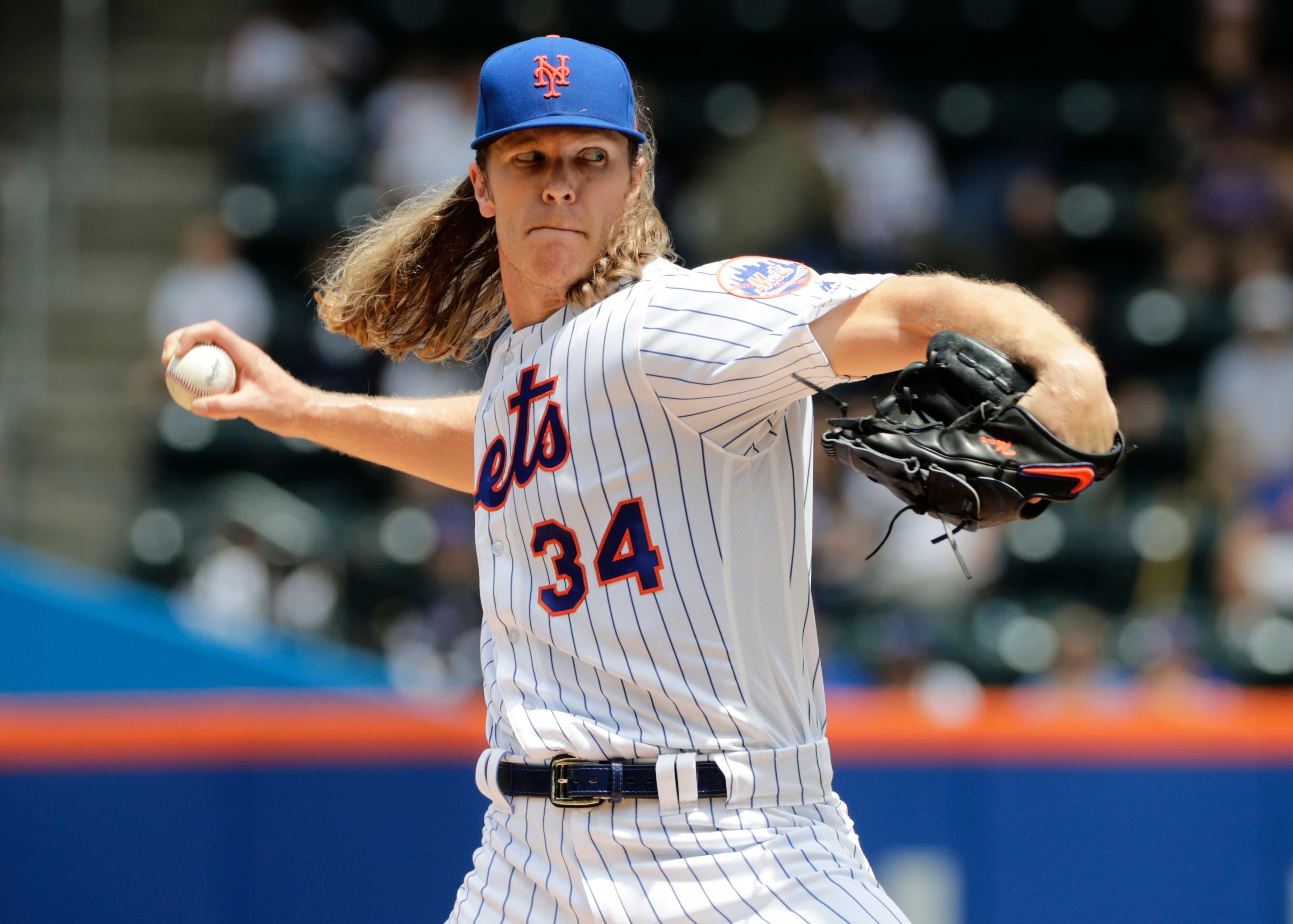 New York Mets' Noah Syndergaard (34) delivers a pitch during the first inning of a baseball game against the Arizona Diamondbacks Sunday, May 20, 2018, in New York. (AP Photo/Frank Franklin II) / AP