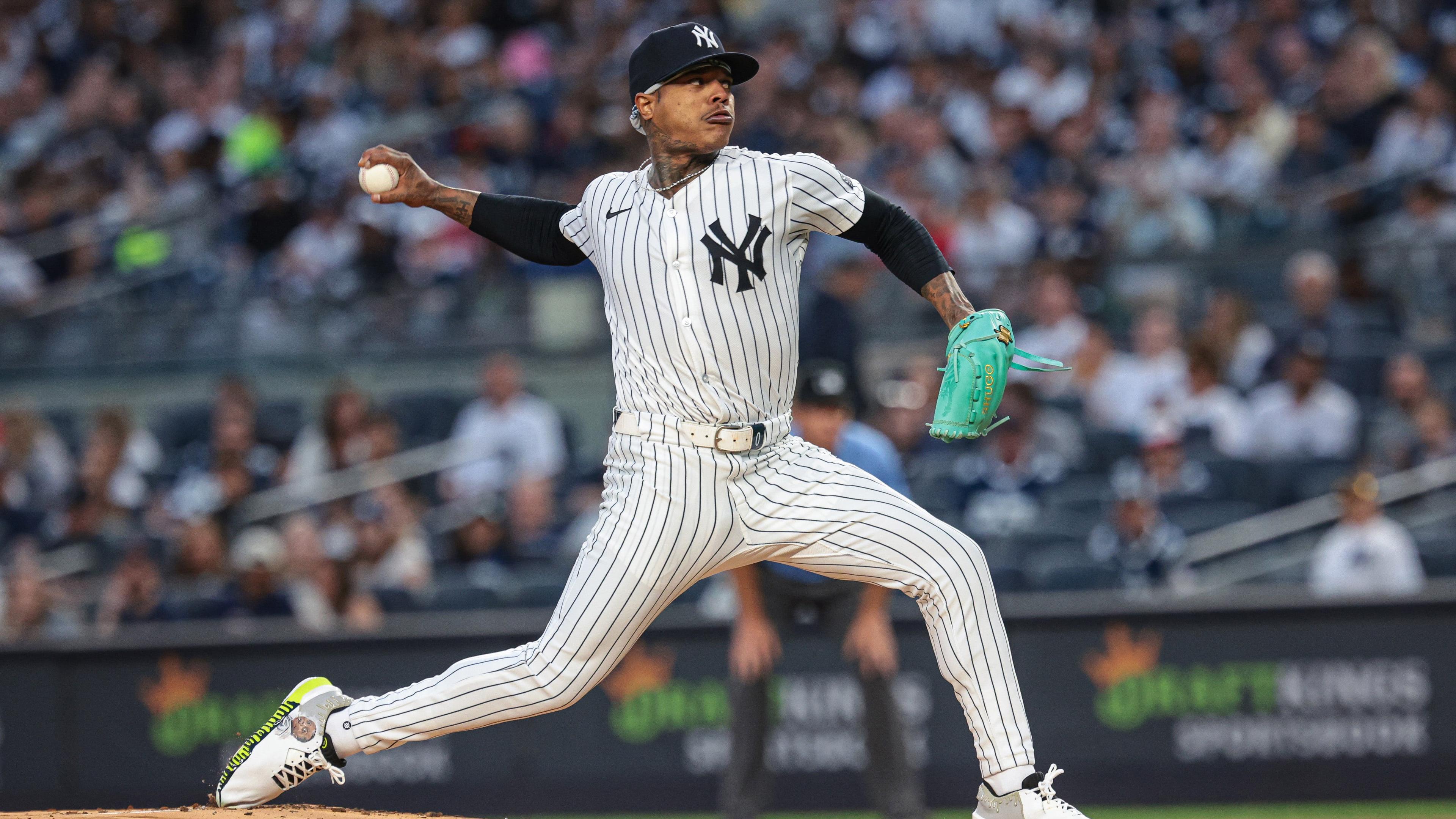 New York Yankees starting pitcher Marcus Stroman (0) delivers a pitch during the first inning against the St. Louis Cardinals at Yankee Stadium. / Vincent Carchietta-USA TODAY Sports