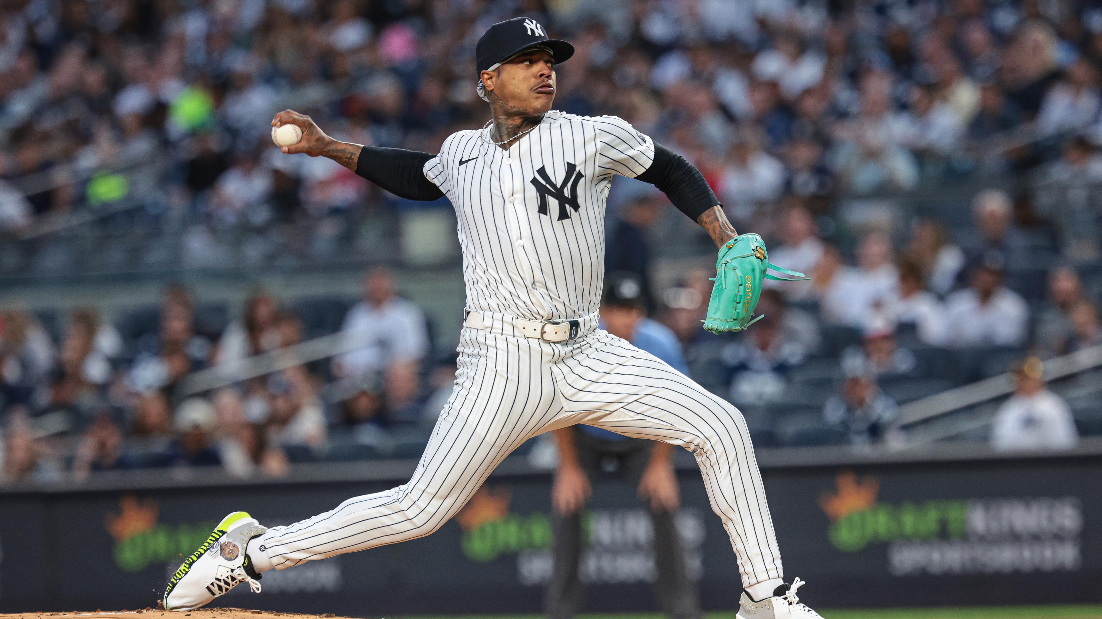 New York Yankees starting pitcher Marcus Stroman (0) delivers a pitch during the first inning against the St. Louis Cardinals at Yankee Stadium.