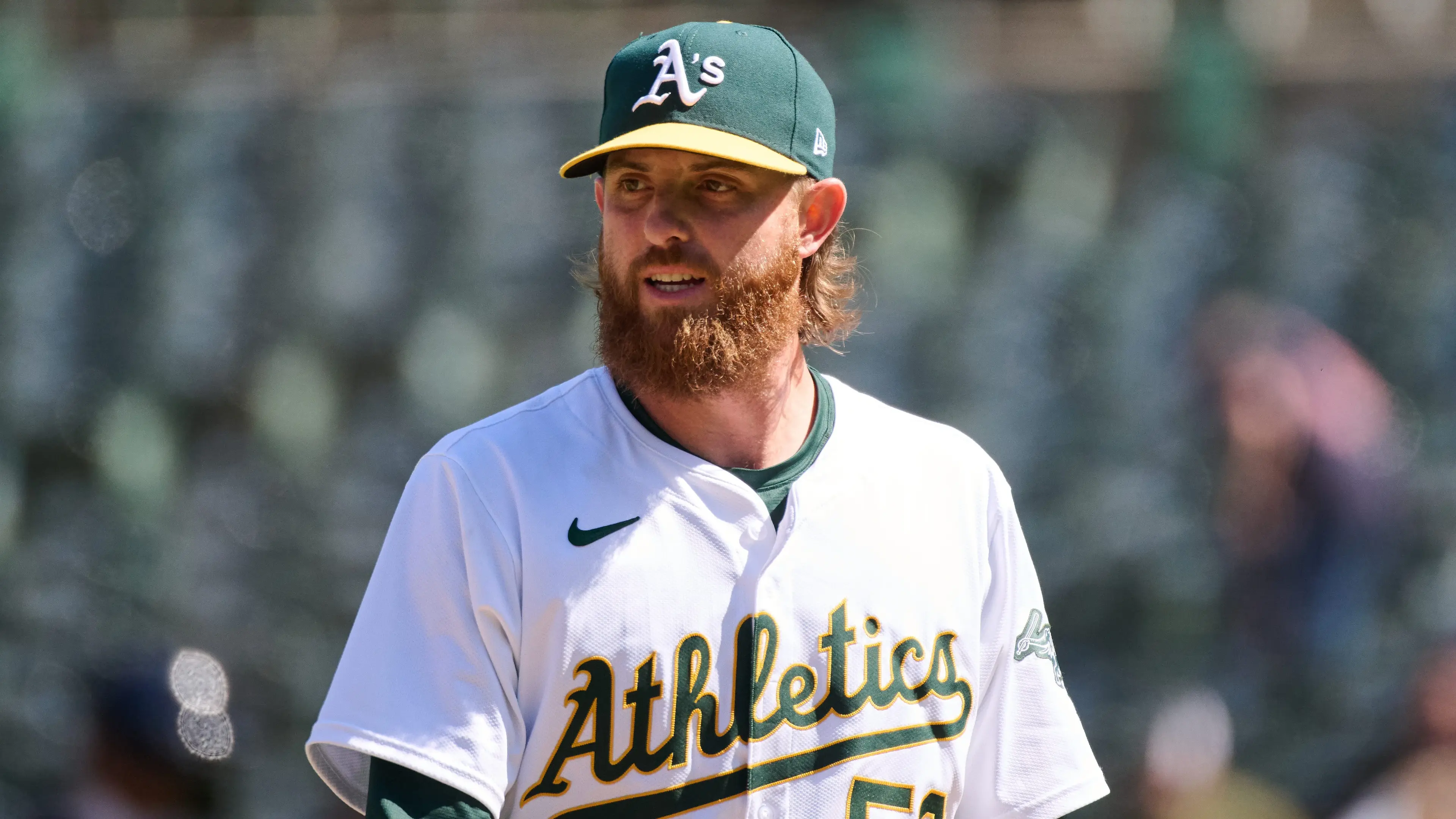 Oakland Athletics pitcher Paul Blackburn (58) walks to the dugout against the Cleveland Guardians after the seventh inning at Oakland-Alameda County Coliseum. / Robert Edwards - USA TODAY Sports