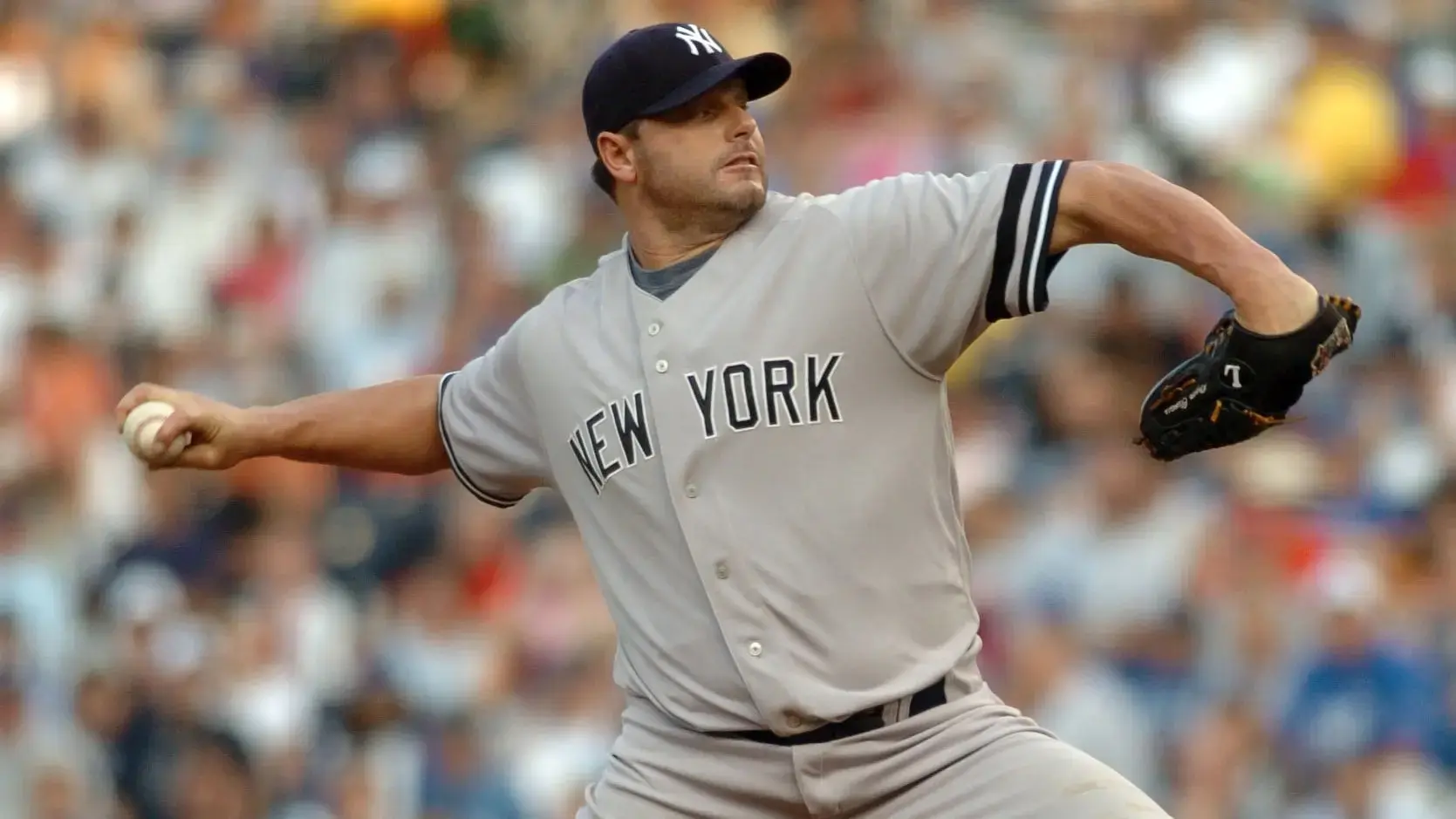 New York Yankees starting pitcher (22) Roger Clemens delivers a pitch in the first inning against the Kansas City Royals at Kauffman Stadium in Kansas City, MO. / John Rieger - USA TODAY Sports
