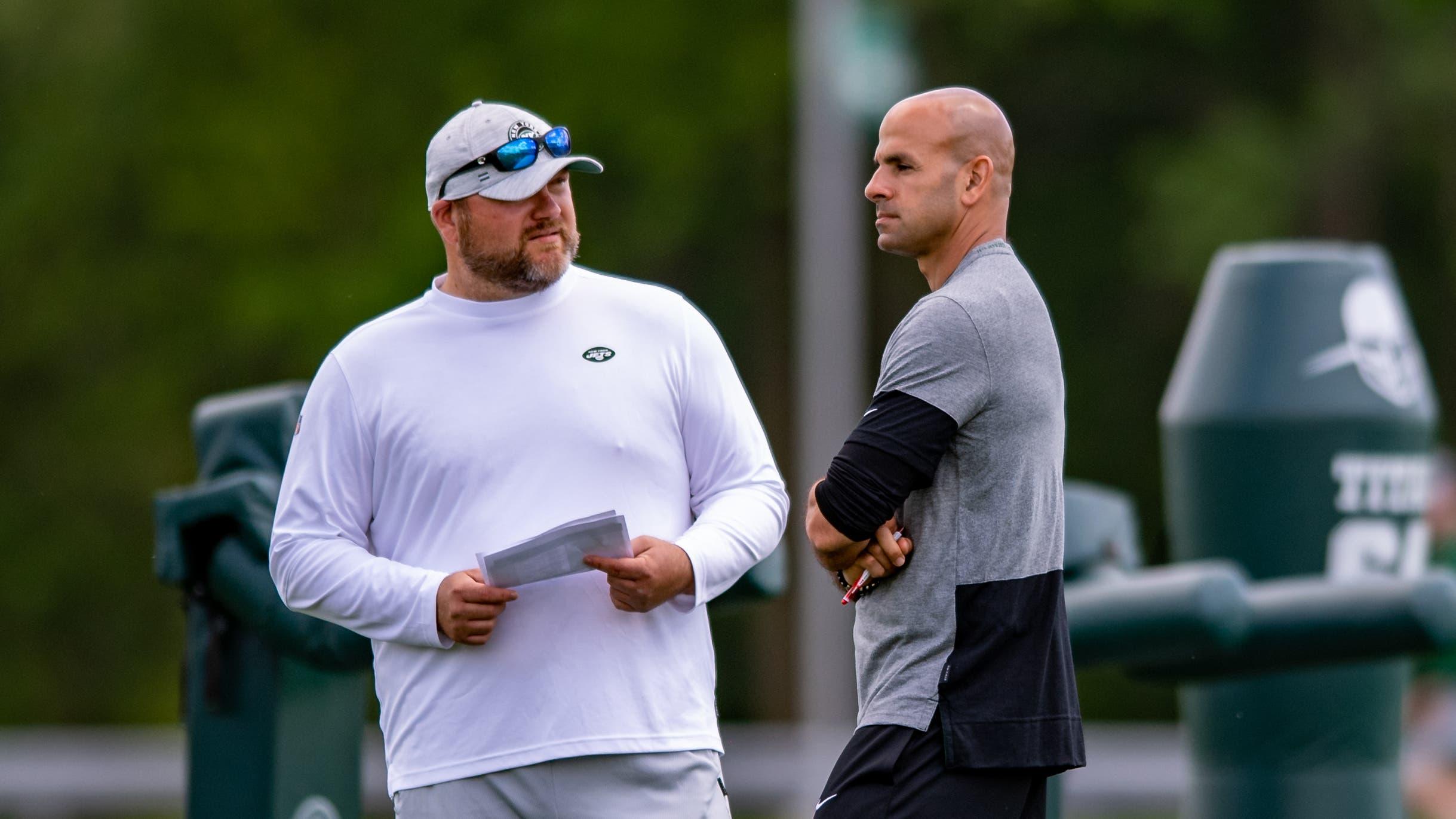 New York Jets general manager Joe Douglas (left) chats with head coach Robert Saleh during an OTA at Jets Atlantic Health Training Center. / John Jones - USA TODAY Sports