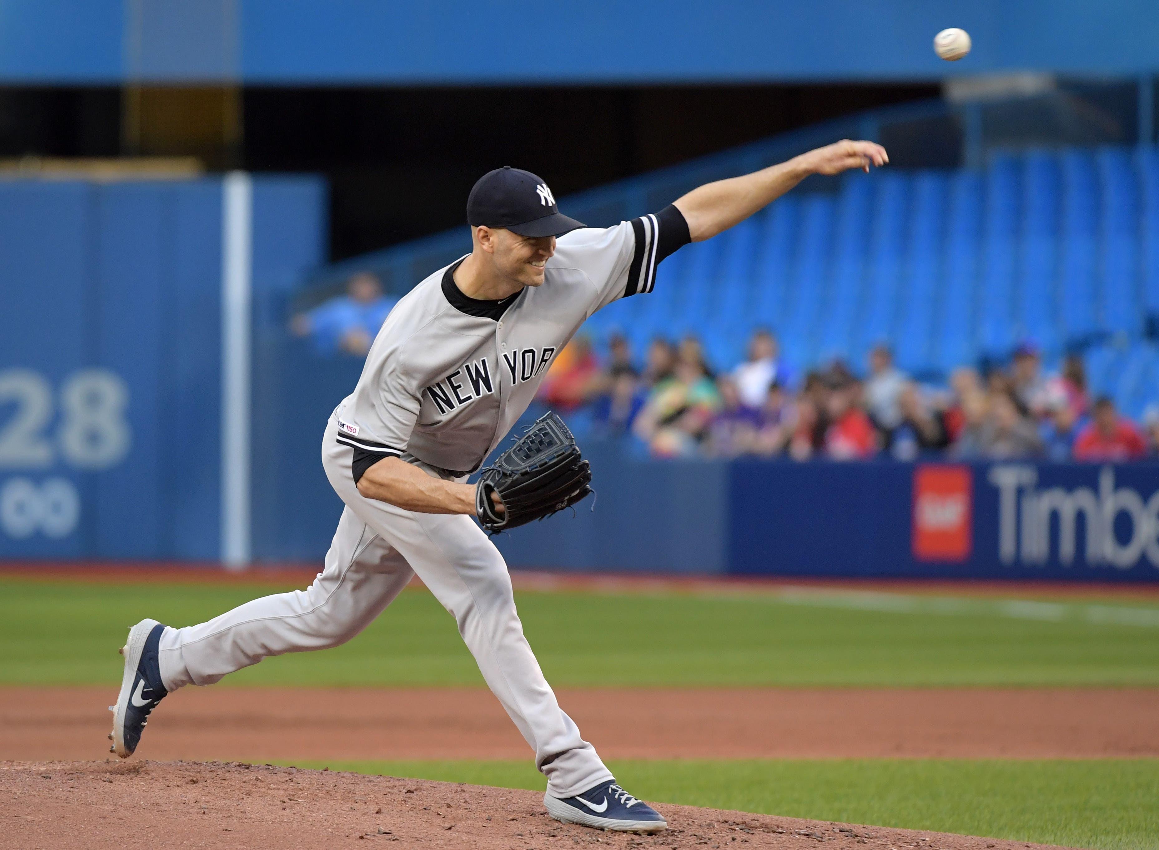 Jun 6, 2019; Toronto, Ontario, CAN; New York Yankees starting pitcher J.A. Happ (34) delivers a pitch against Toronto Blue Jays in the first inning at Rogers Centre. Mandatory Credit: Dan Hamilton-USA TODAY Sports / Dan Hamilton