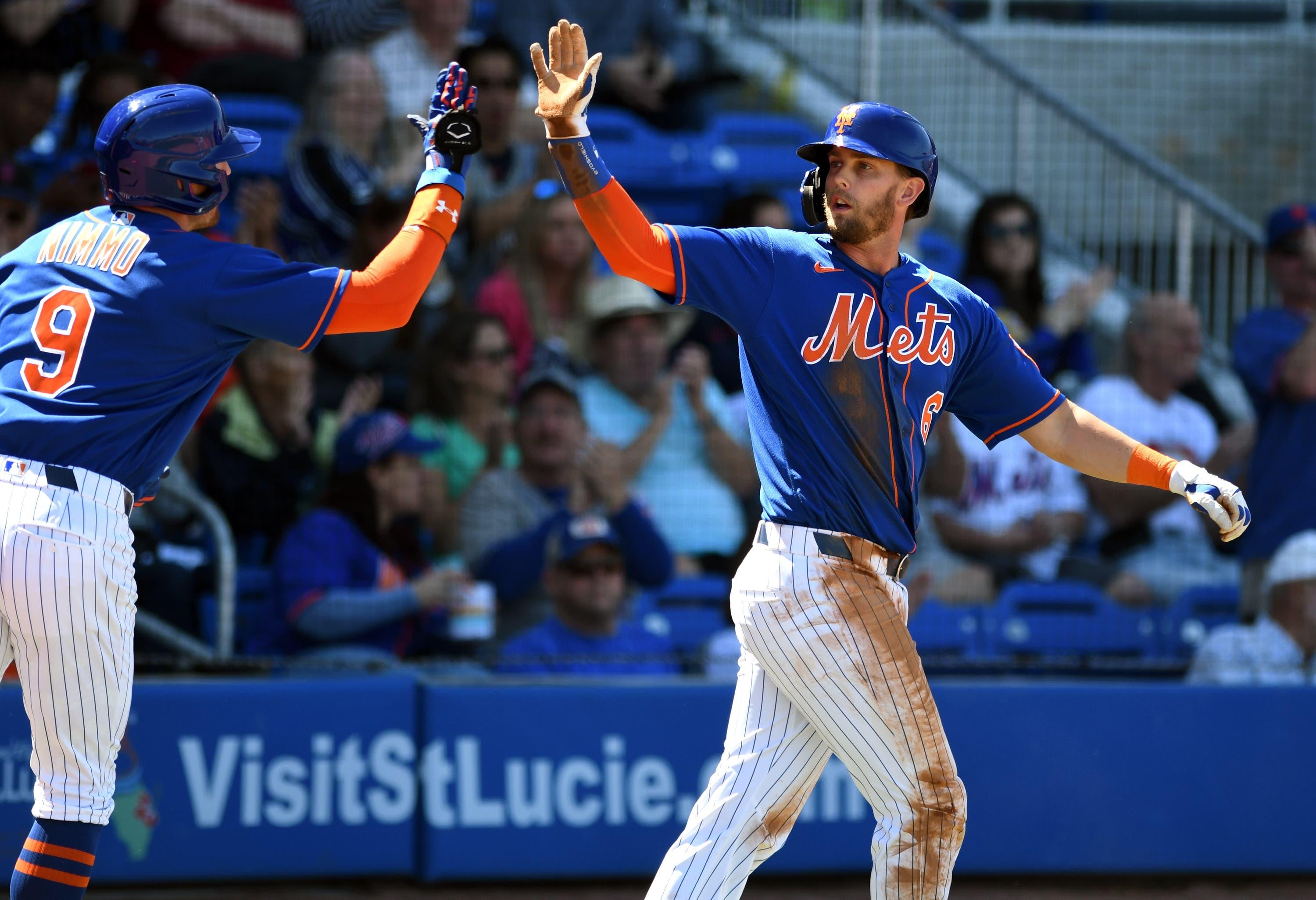 Mar 1, 2020; Port St. Lucie, Florida, USA; New York Mets outfielder Jeff McNeil (6) congratulates teammate Brandon Nimmo (9) after they both scored in the first inning against the Washington Nationals at Clover Park. Mandatory Credit: Jim Rassol-USA TODAY Sports / Jim Rassol