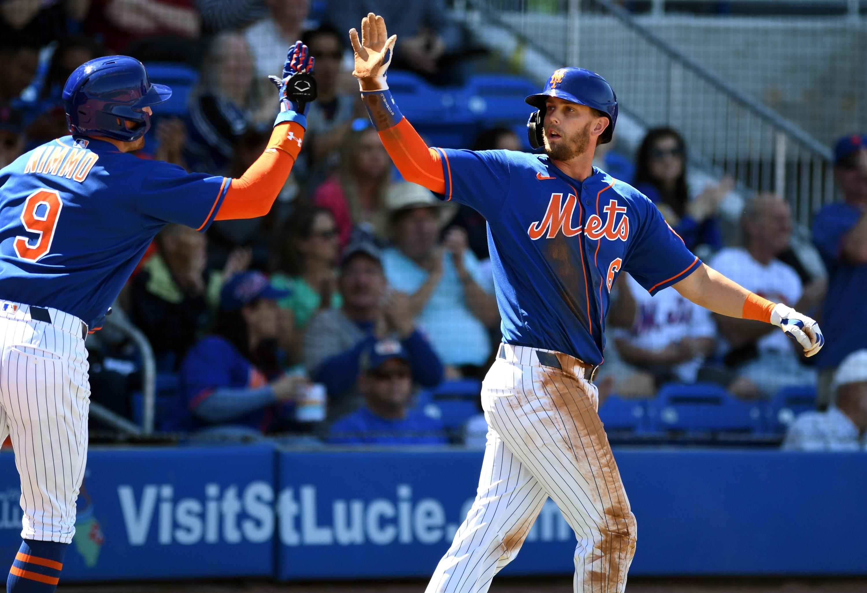 Mar 1, 2020; Port St. Lucie, Florida, USA; New York Mets outfielder Jeff McNeil (6) congratulates teammate Brandon Nimmo (9) after they both scored in the first inning against the Washington Nationals at Clover Park. Mandatory Credit: Jim Rassol-USA TODAY Sports