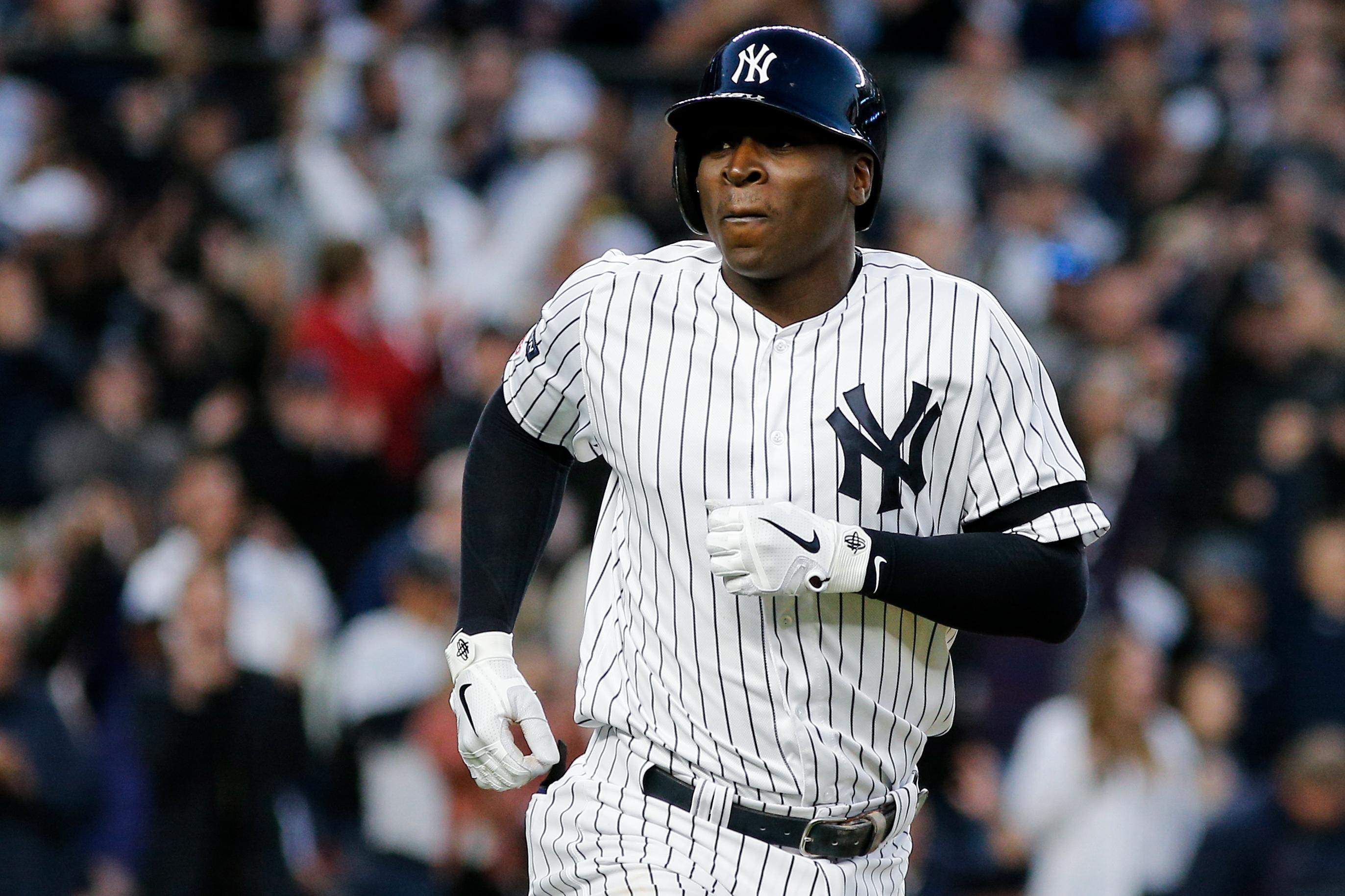 Oct 5, 2019; Bronx, NY, USA; New York Yankees shortstop Didi Gregorius (18) reacts to hitting a grand slam against the Minnesota Twins in the third inning in game two of the 2019 ALDS playoff baseball series at Yankee Stadium. Mandatory Credit: Andy Marlin-USA TODAY Sports