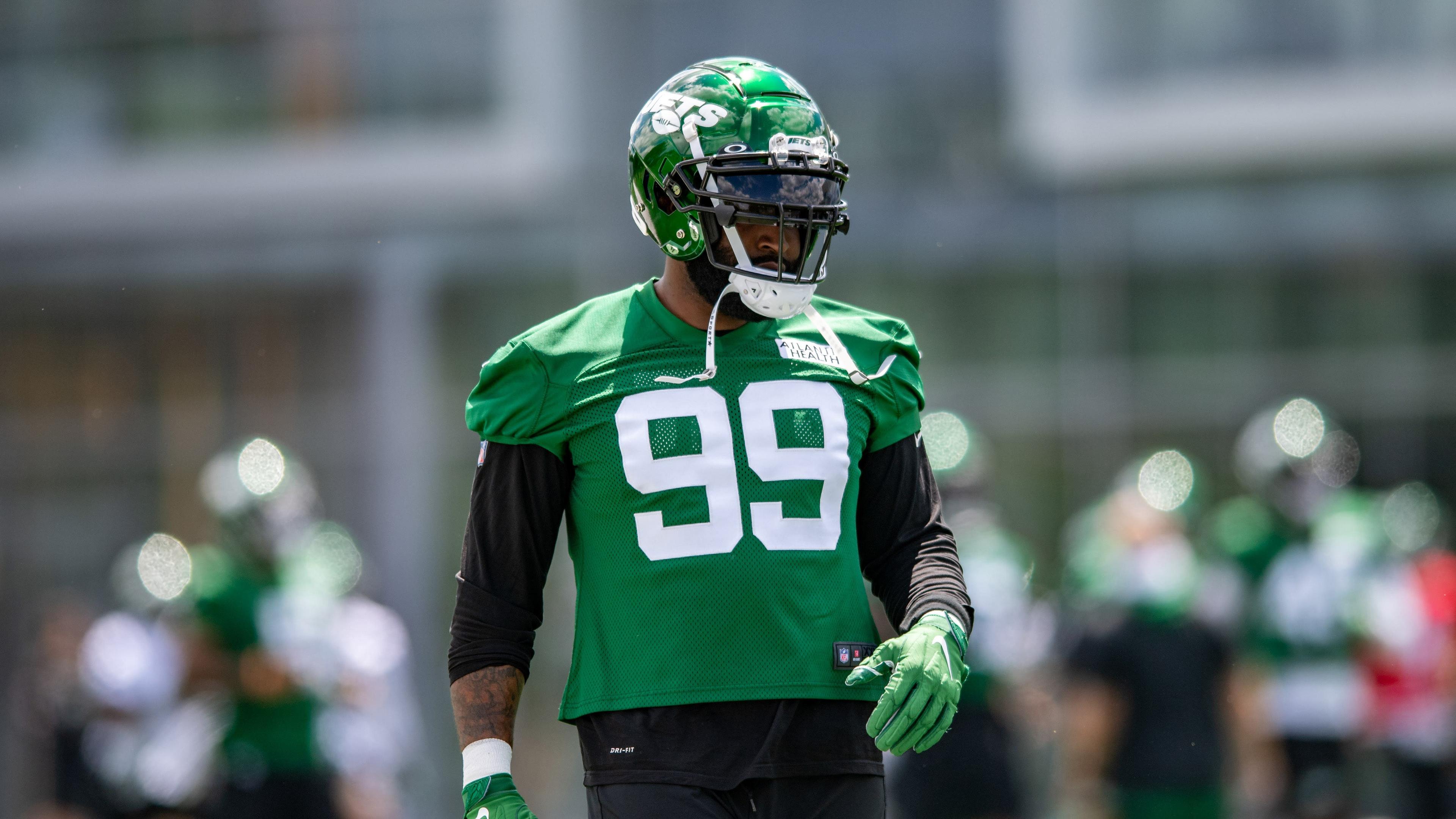 New York Jets defensive end Vinny Curry (99) participates in a drill during an OTA at Jets Atlantic Health Training Center. / John Jones - USA TODAY Sports