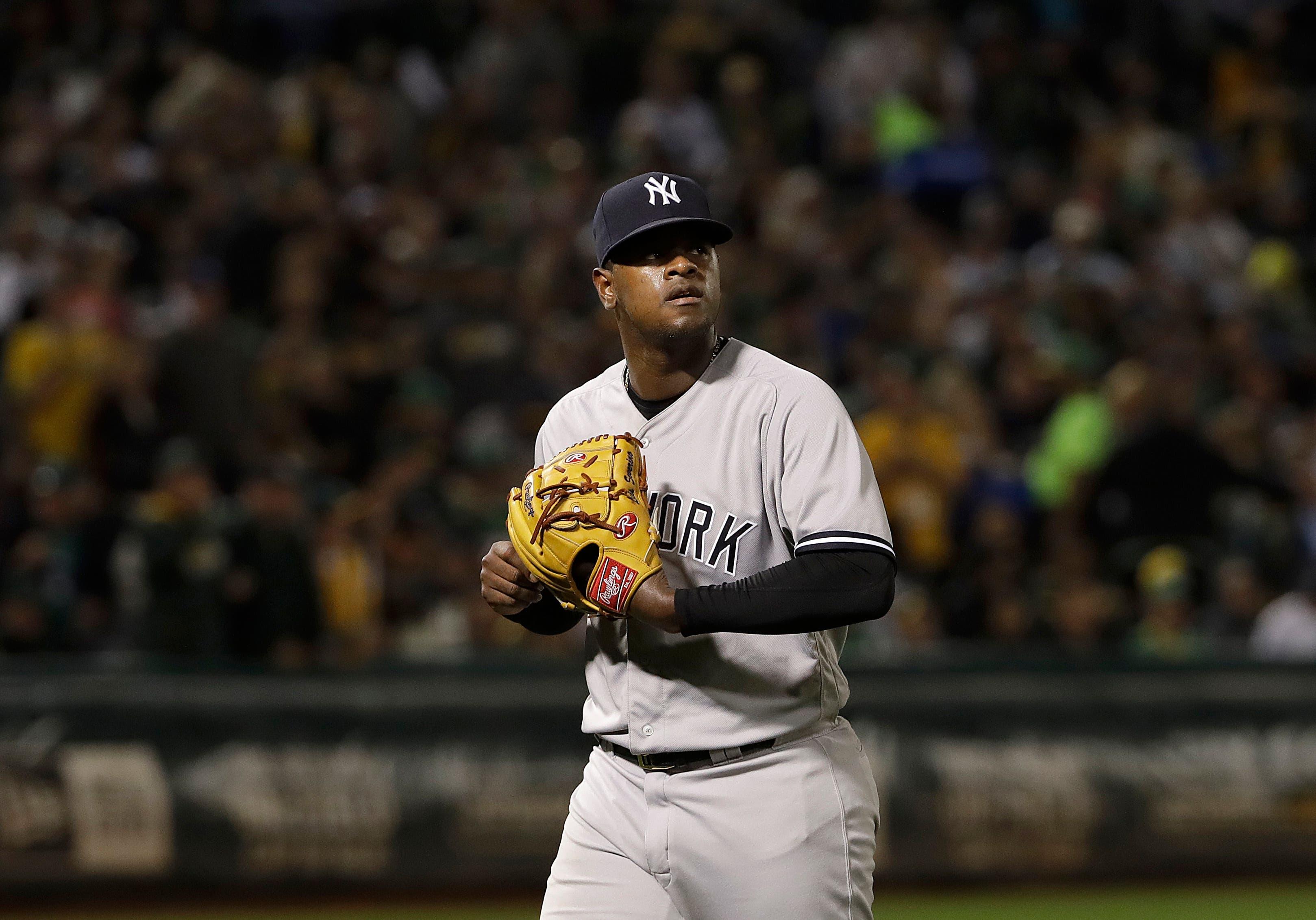 New York Yankees pitcher Luis Severino walks toward the dugout after being relieved during the third inning of a baseball game against the Oakland Athletics in Oakland, Calif., Wednesday, Sept. 5, 2018. (AP Photo/Jeff Chiu) / AP