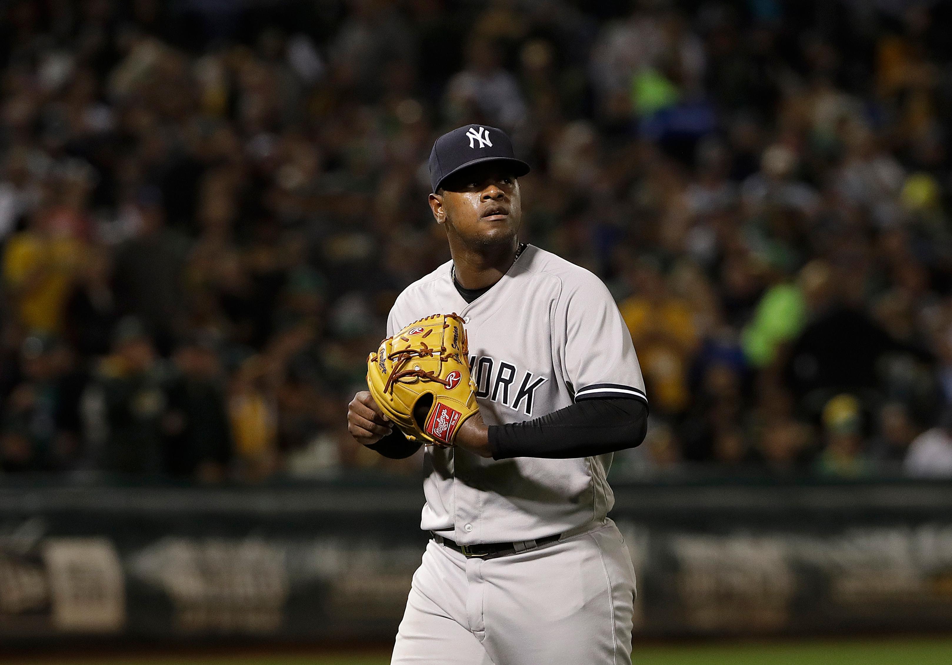 New York Yankees pitcher Luis Severino walks toward the dugout after being relieved during the third inning of a baseball game against the Oakland Athletics in Oakland, Calif., Wednesday, Sept. 5, 2018. (AP Photo/Jeff Chiu)