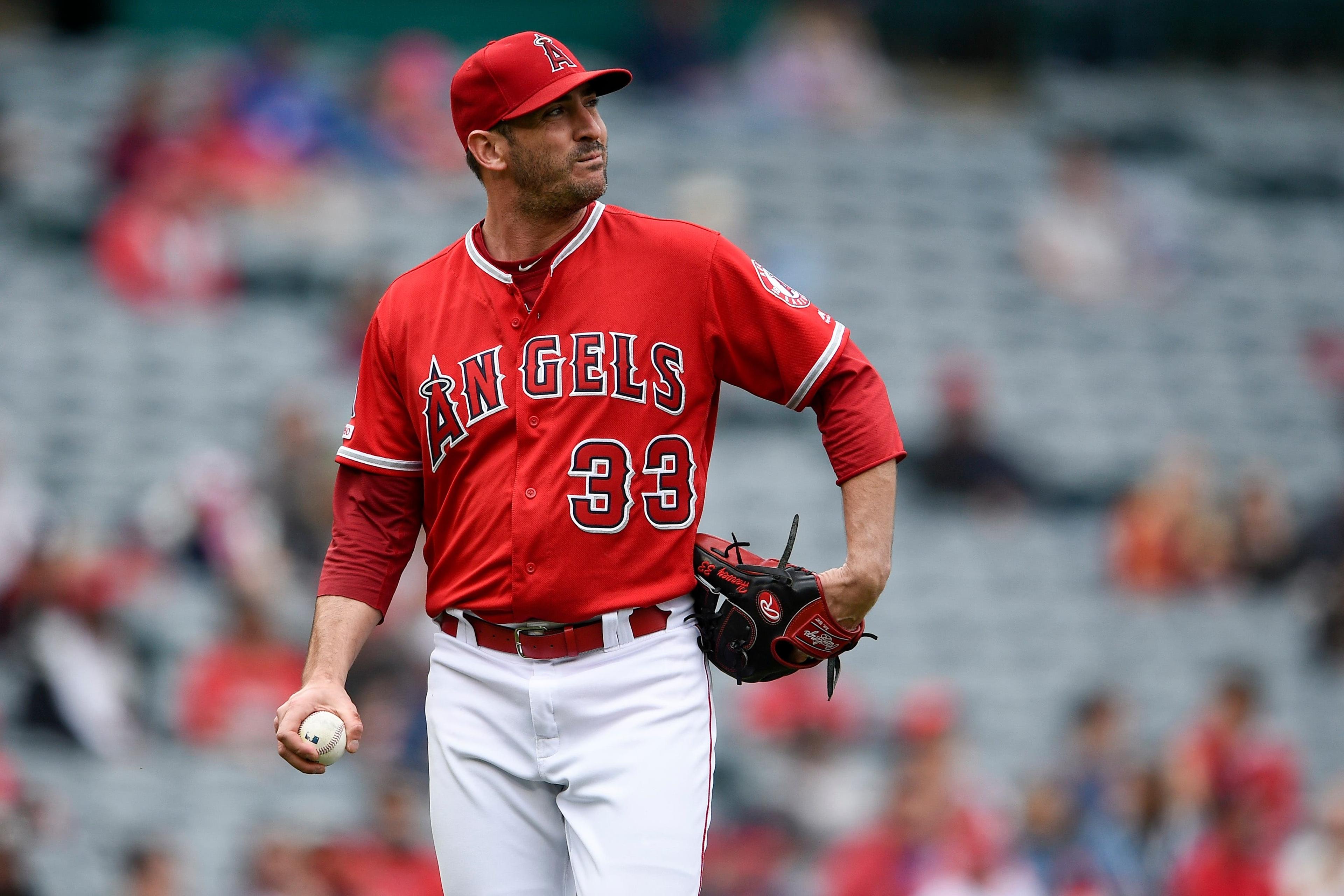 May 23, 2019; Anaheim, CA, USA; Los Angeles Angels starting pitcher Matt Harvey (33) reacts after allowing a single to Minnesota Twins left fielder Eddie Rosario (20) during the second inning at Angel Stadium of Anaheim. Mandatory Credit: Kelvin Kuo-USA TODAY Sports / Kelvin Kuo