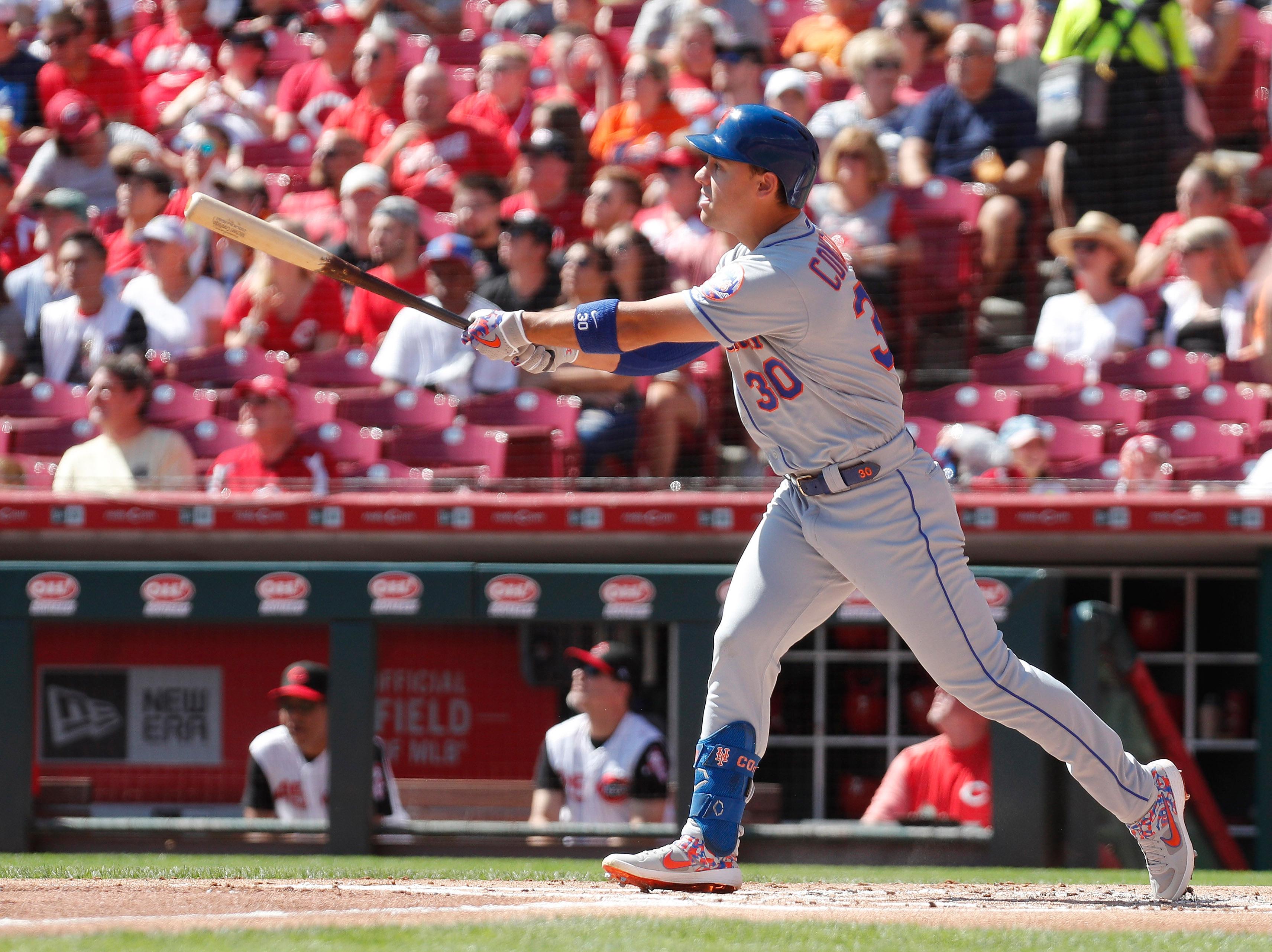 Sep 22, 2019; Cincinnati, OH, USA; New York Mets right fielder Michael Conforto (30) hits a three-run home against the Cincinnati Reds during the first inning at Great American Ball Park. Mandatory Credit: David Kohl-USA TODAY Sports