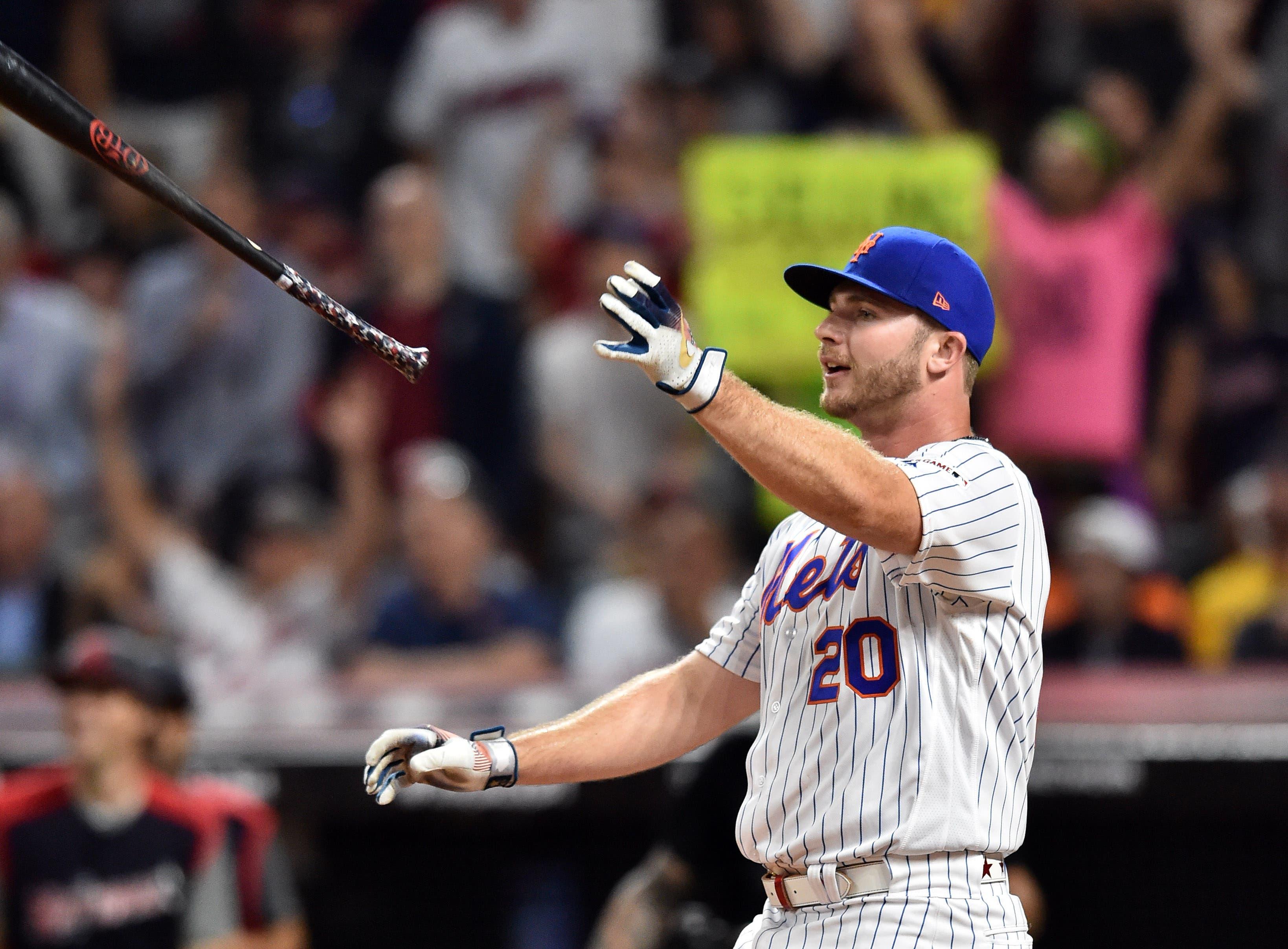 Jul 8, 2019; Cleveland, OH, USA; New York Mets first baseman Pete Alonso (20) celebrates after winning the 2019 MLB Home Run Derby at Progressive Field. Mandatory Credit: Ken Blaze-USA TODAY Sports / Ken Blaze