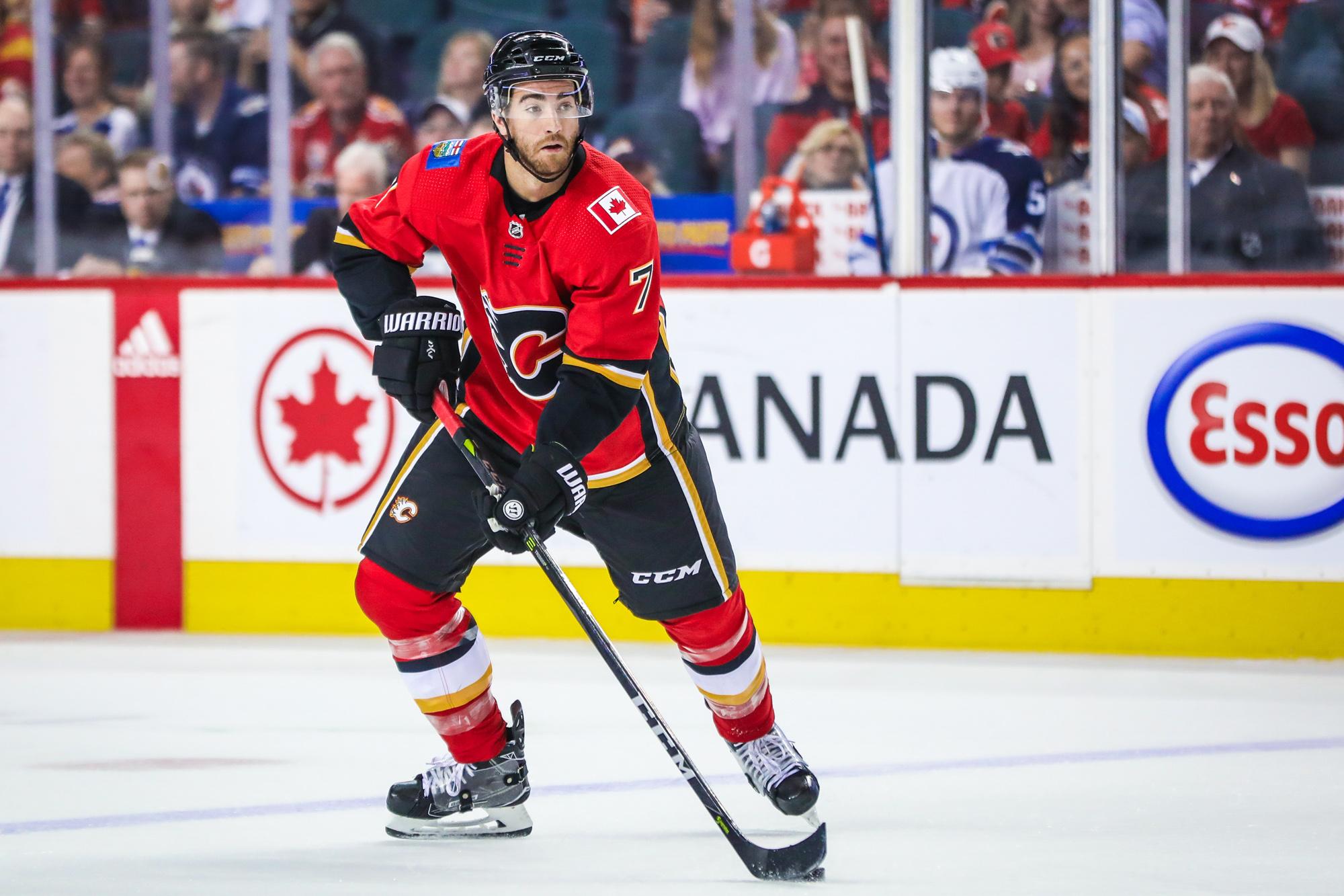 Sep 30, 2017; Calgary, Alberta, CAN; Calgary Flames defenseman T.J. Brodie (7) controls the puck against the Winnipeg Jets during the first period at Scotiabank Saddledome. Mandatory Credit: Sergei Belski-USA TODAY Sports