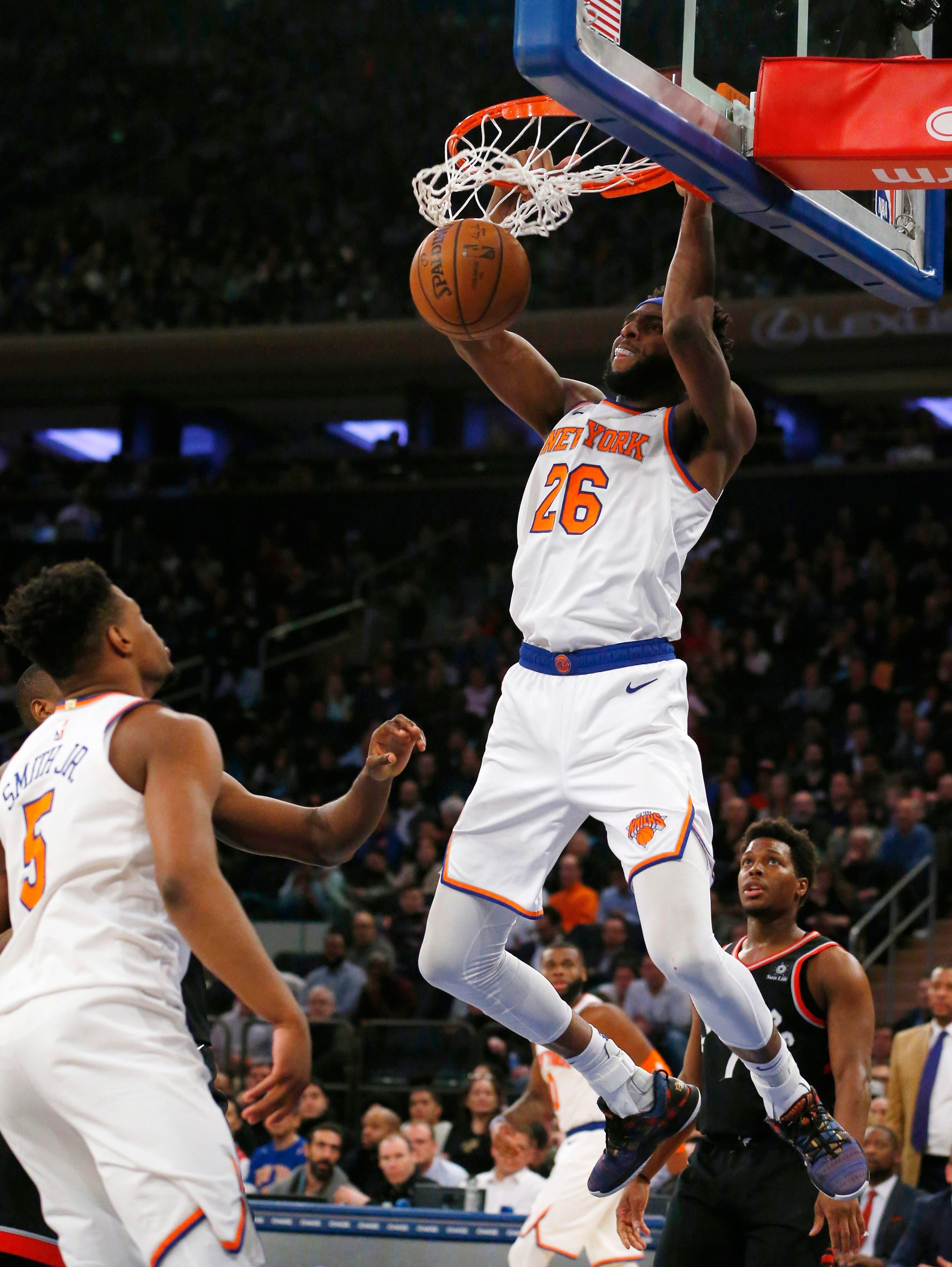 New York Knicks center Mitchell Robinson dunks against the Toronto Raptors during the second half at Madison Square Garden. / Noah K. Murray/USA TODAY Sports