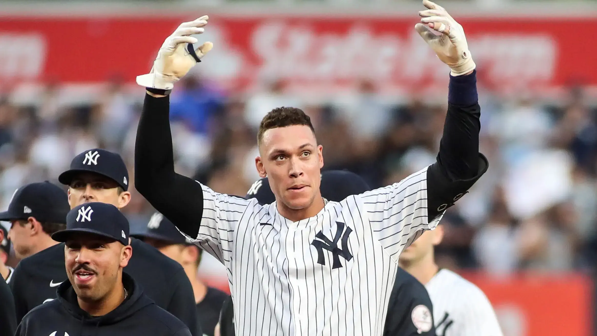 Oct 3, 2021; Bronx, New York, USA; New York Yankees right fielder Aaron Judge (99) waves to the crowd after his game winning RBI single to defeat the Tampa Bay Rays 1-0 and clinch a wildcard playoff spot at Yankee Stadium. Mandatory Credit: Wendell Cruz-USA TODAY Sports / Wendell Cruz-USA TODAY Sports