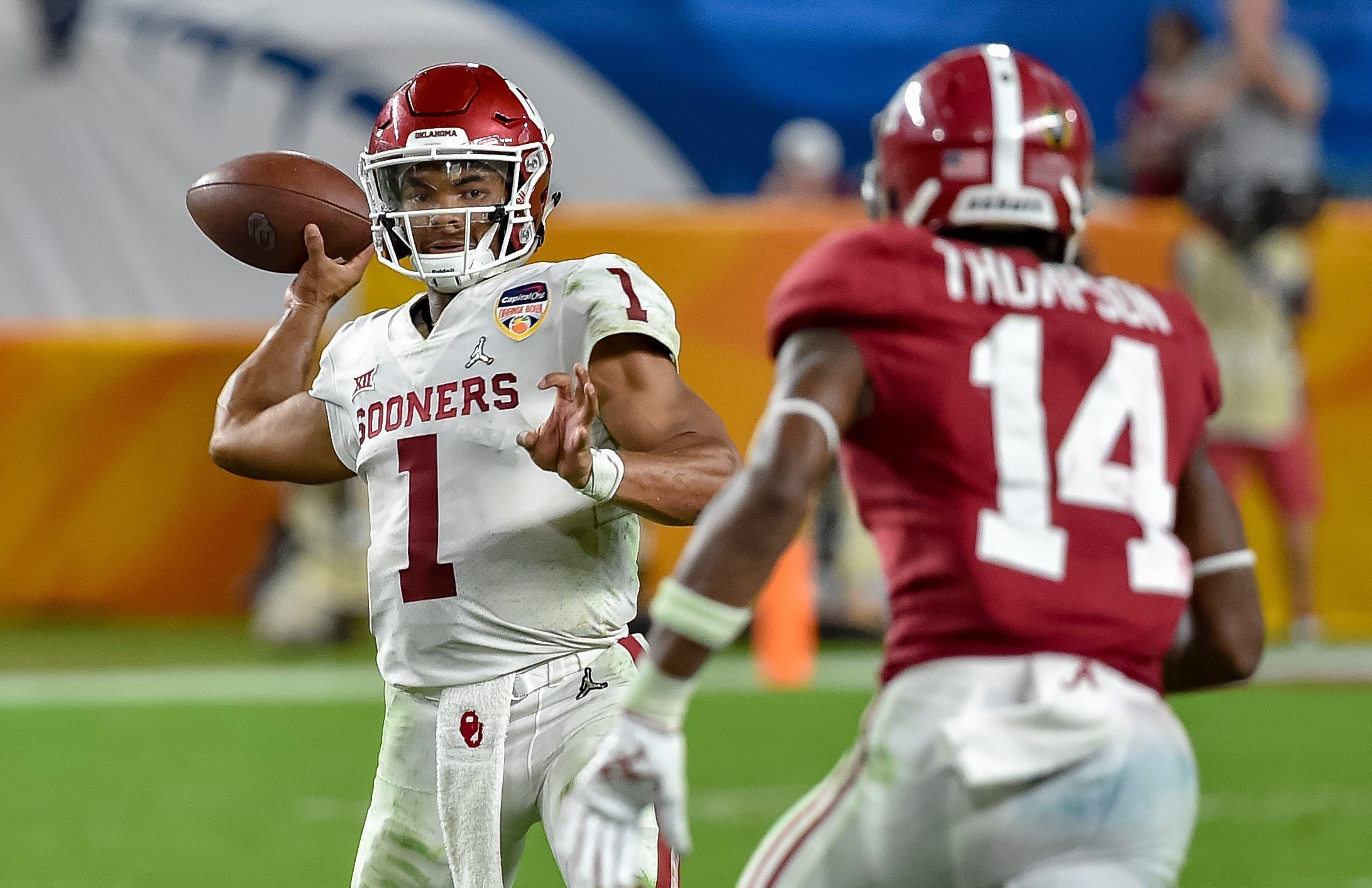 Dec 29, 2018; Miami Gardens, FL, USA; Oklahoma Sooners quarterback Kyler Murray (1) throws a pass as Alabama Crimson Tide defensive back Deionte Thompson (14) applies pressure in the 2018 Orange Bowl college football playoff semifinal game at Hard Rock Stadium. Mandatory Credit: Steve Mitchell-USA TODAY Sports / Steve Mitchell