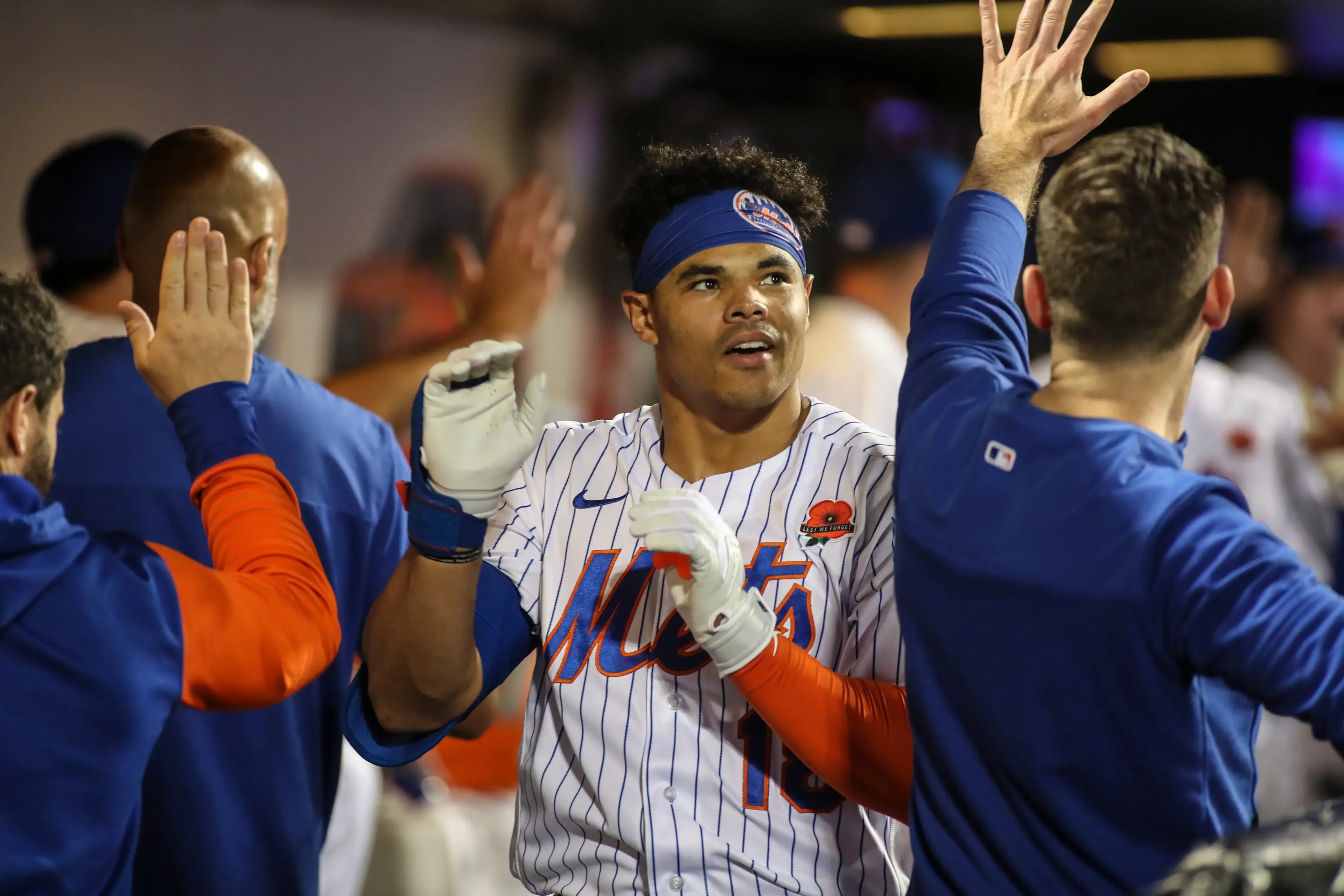 New York Mets left fielder Nick Plummer (18) is congratulated in the dugout after hitting a three-run home run in the fourth inning against the Washington Nationals at Citi Field. / Wendell Cruz-USA TODAY Sports